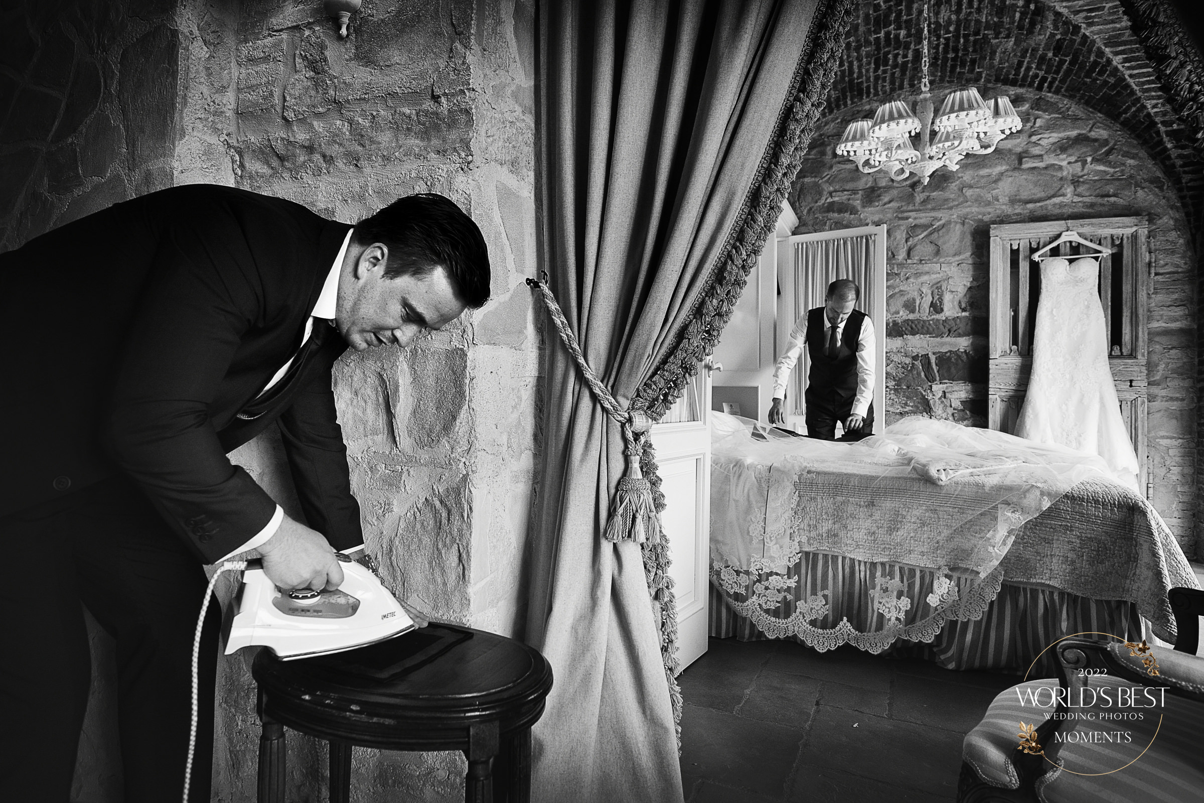 Men Ironing clothes getting ready moment by Eduardo Agresti 