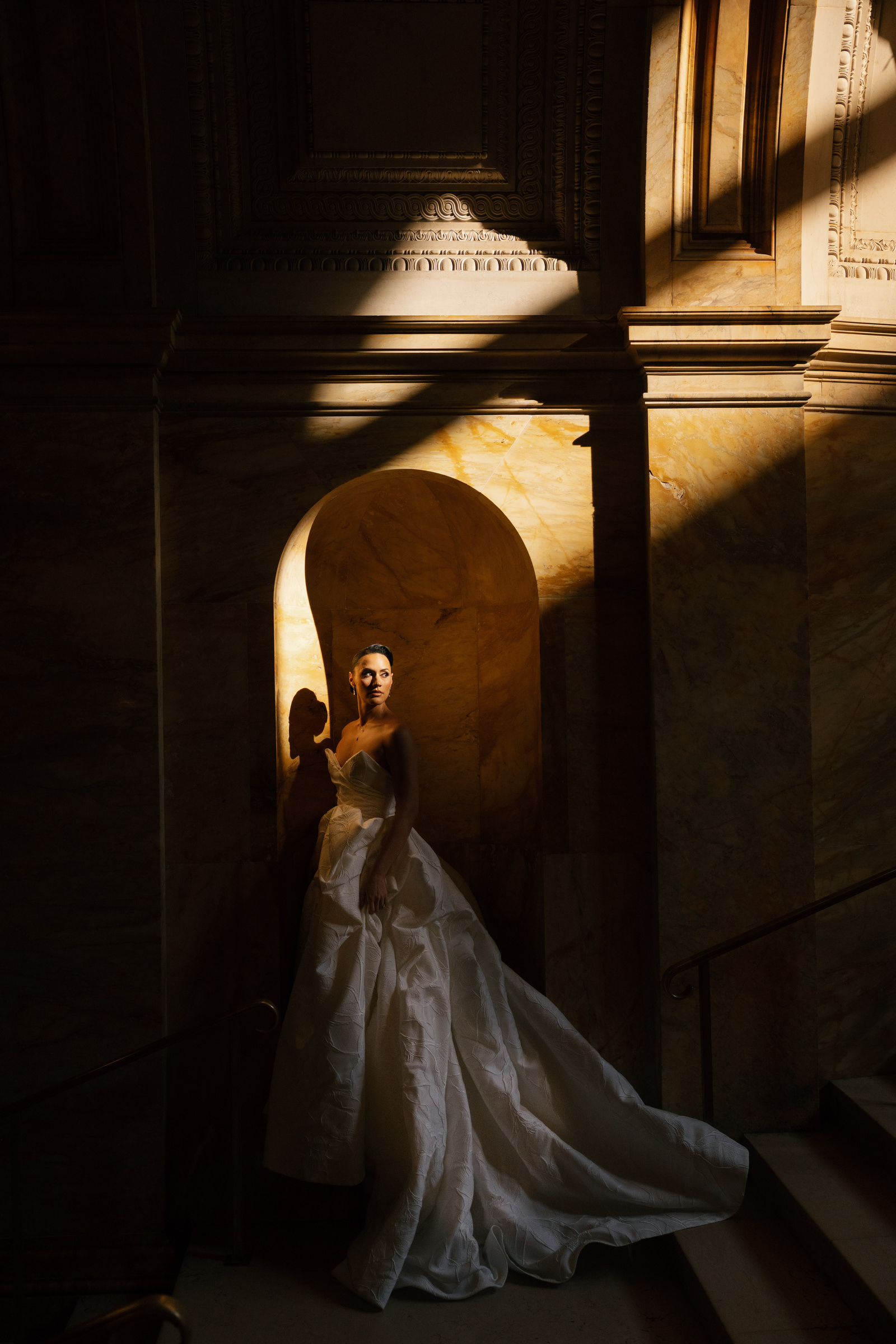 Bride in luxury gown at Boston Public Library