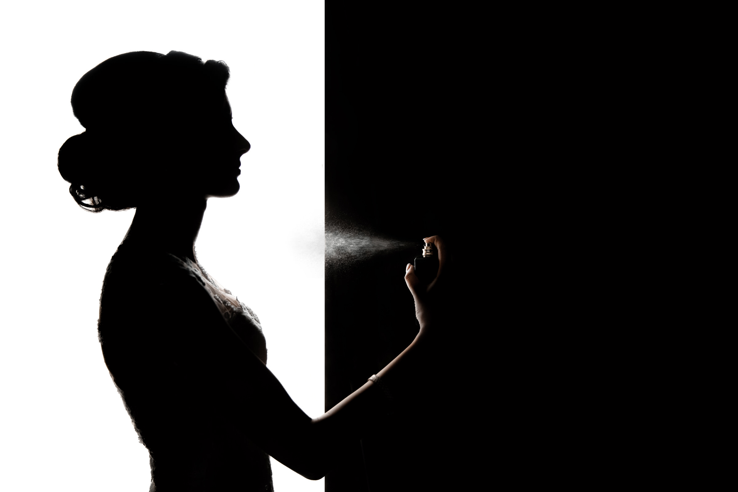 Bride silhouette getting ready