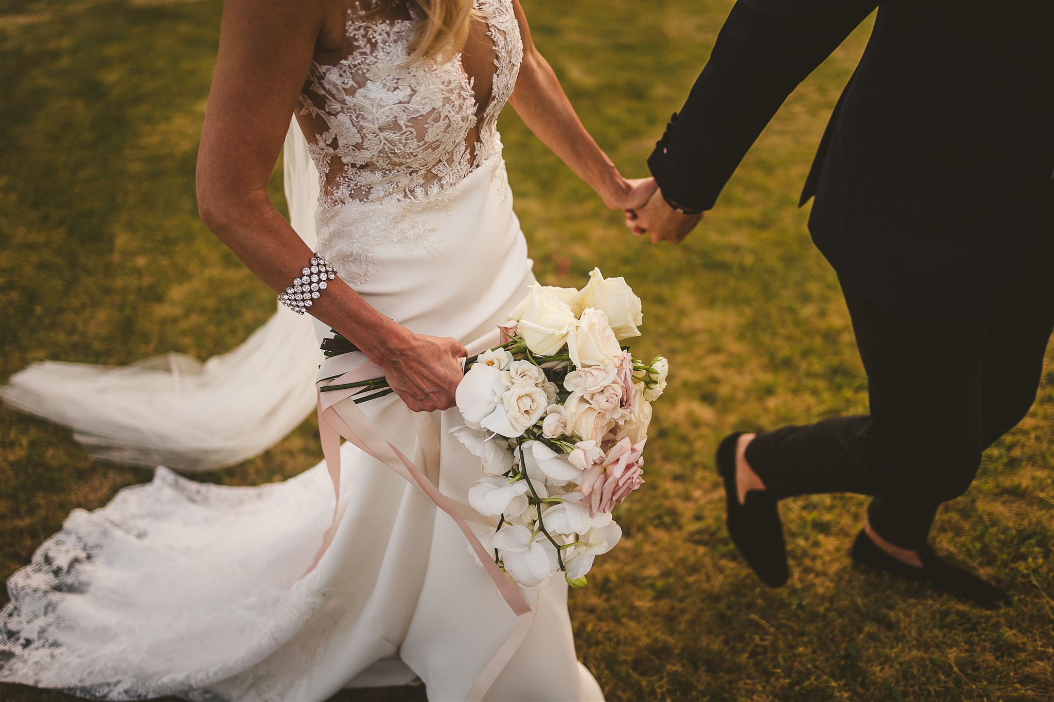 cropped-shot-of-bride-walking-with-groom-best-wedding-photographer-italy-livio-lacurre-photography