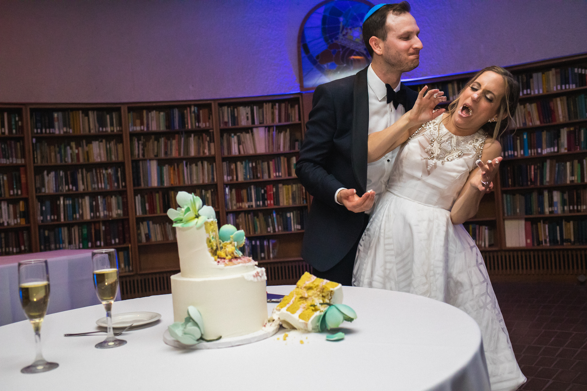 Cute couple cake shot during wedding by Annie Bang of Los Angeles