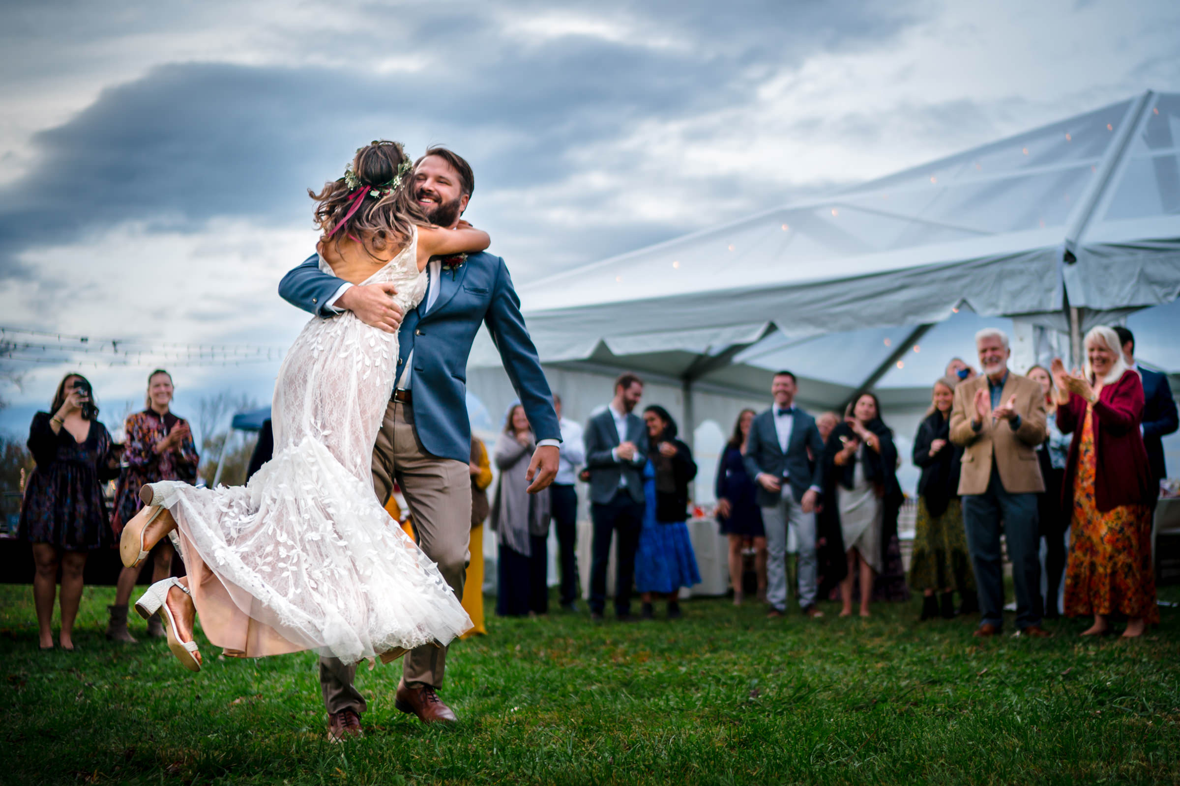 Bride leaps into grooms arms at Meadows Farm Yoga Retreat Bee Two Sweet
