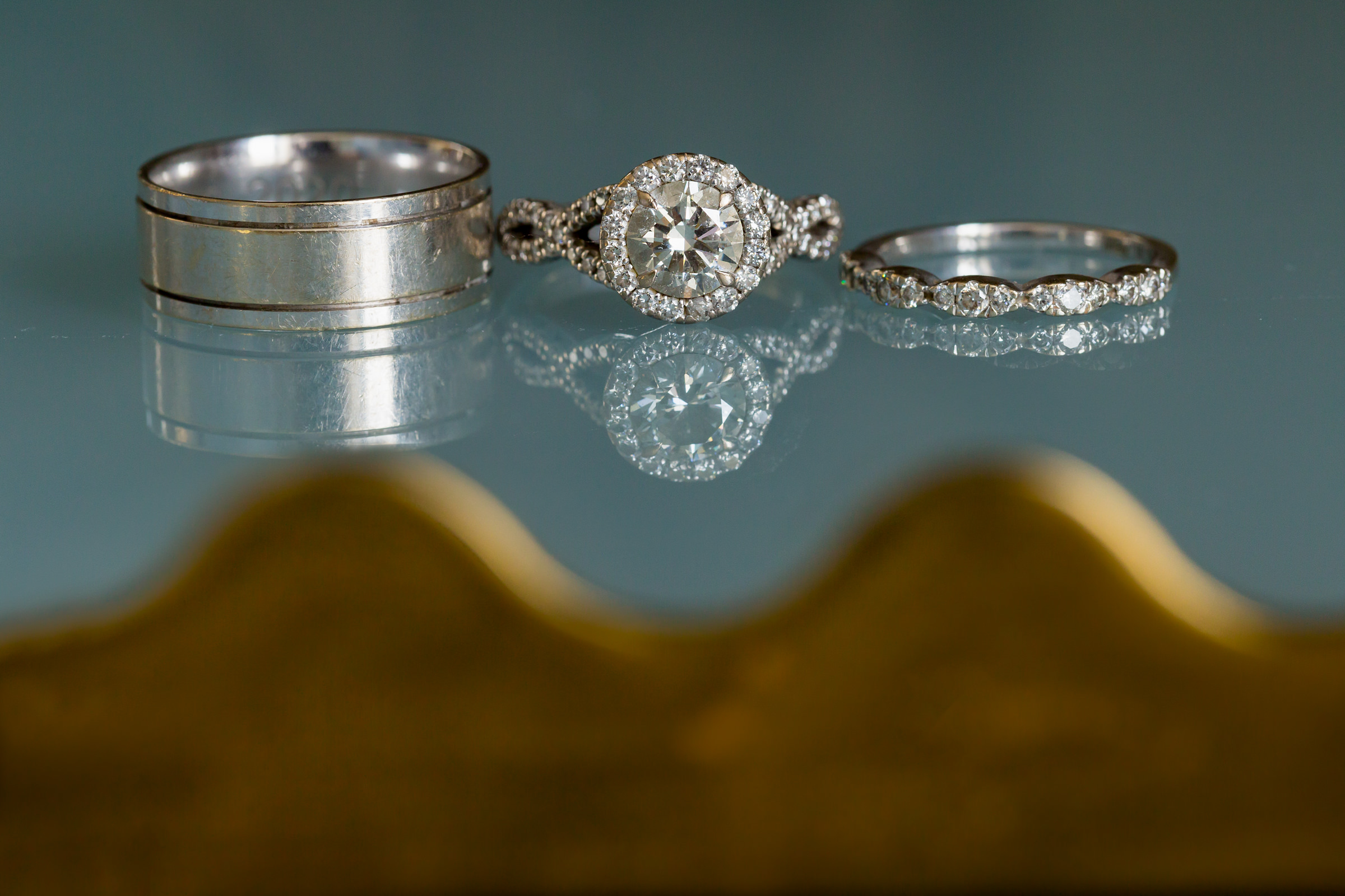 Diamond and white gold rings reflected Procopio Photography
