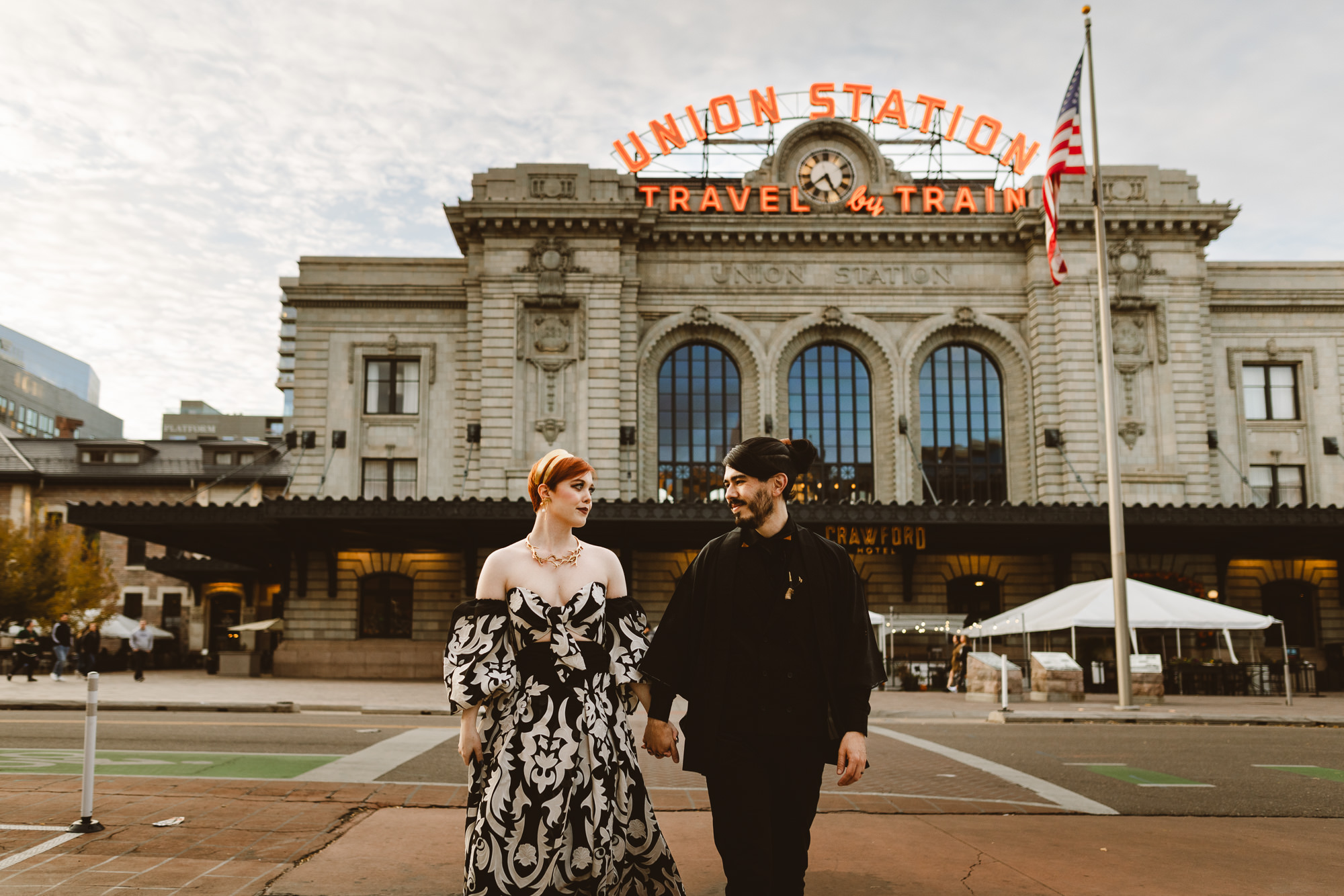 artsy-couple-against-union-station-photo-by-kate-merrill-photo
