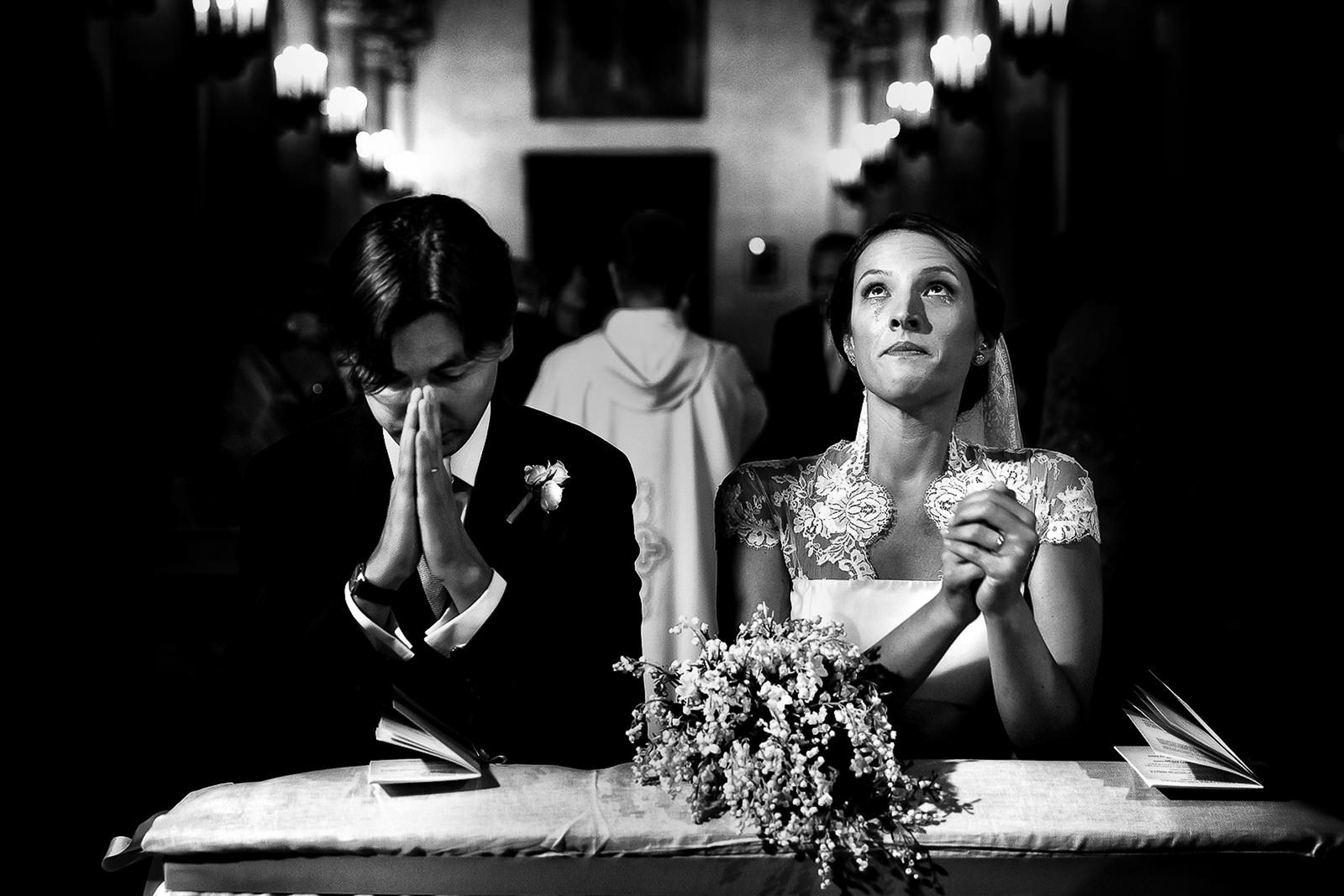 photo-of-couple-praying-during-wedding-ceremony-by-rino-cordella-in-puglia-italy