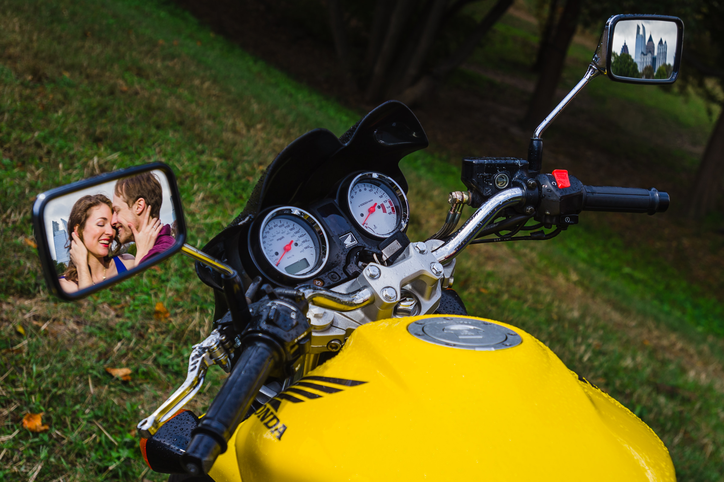 couple-reflected-in-mirror-of-yellow-motor-scooter-photo-by-viridian-images-photography