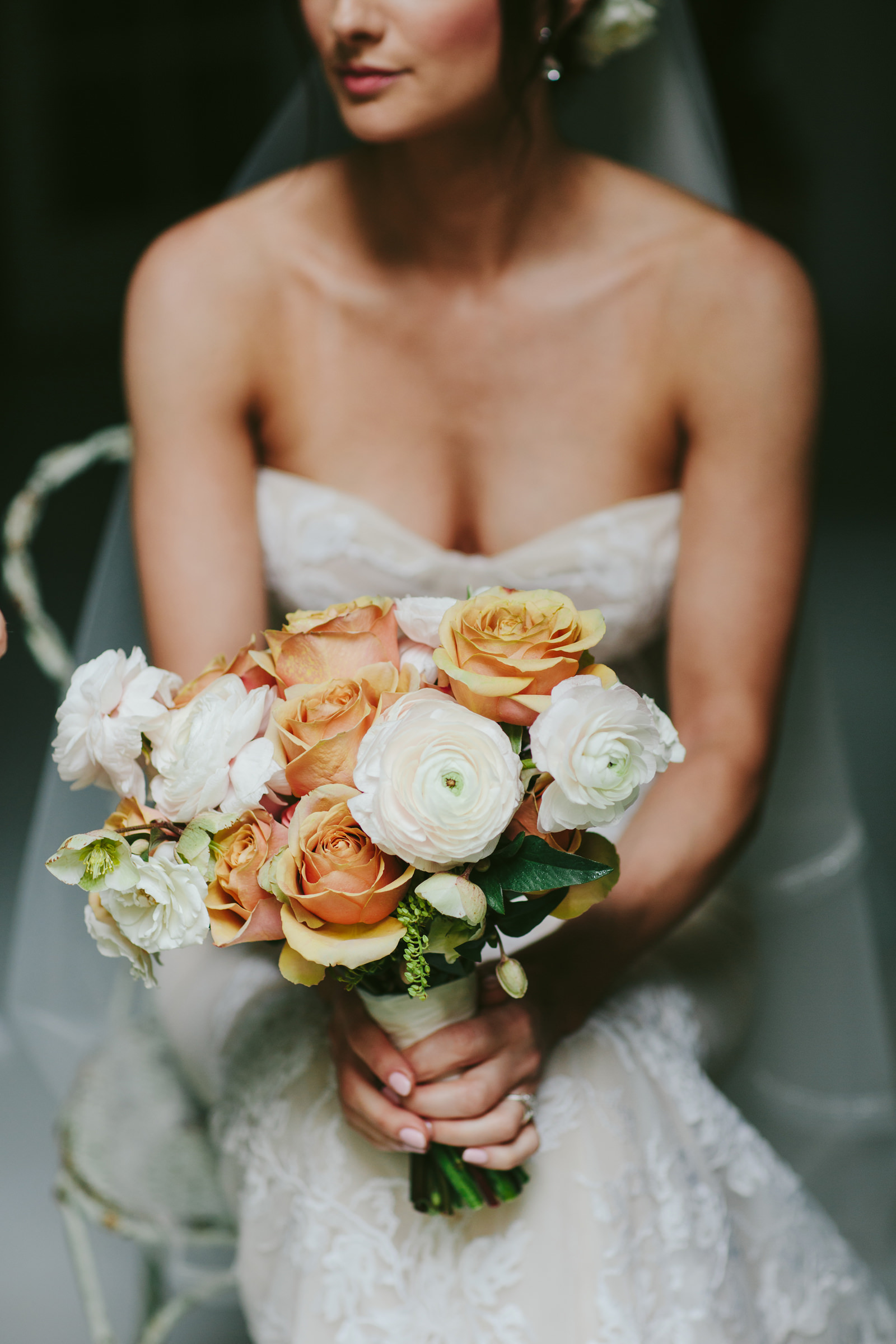 Bride portrait with focus on bouquet