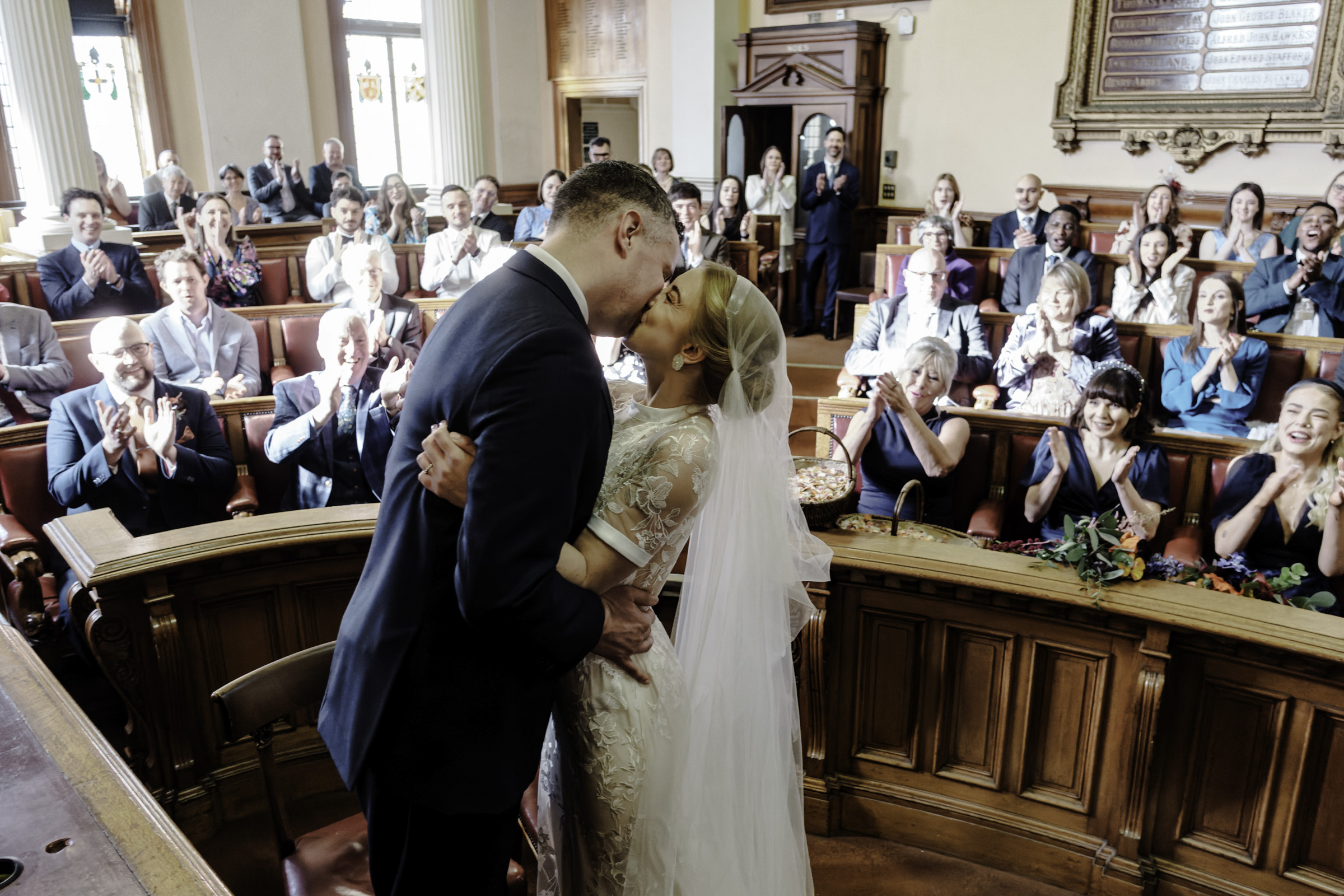 Ceremonial kiss Bristol Town Hall wedding Oliver Holder