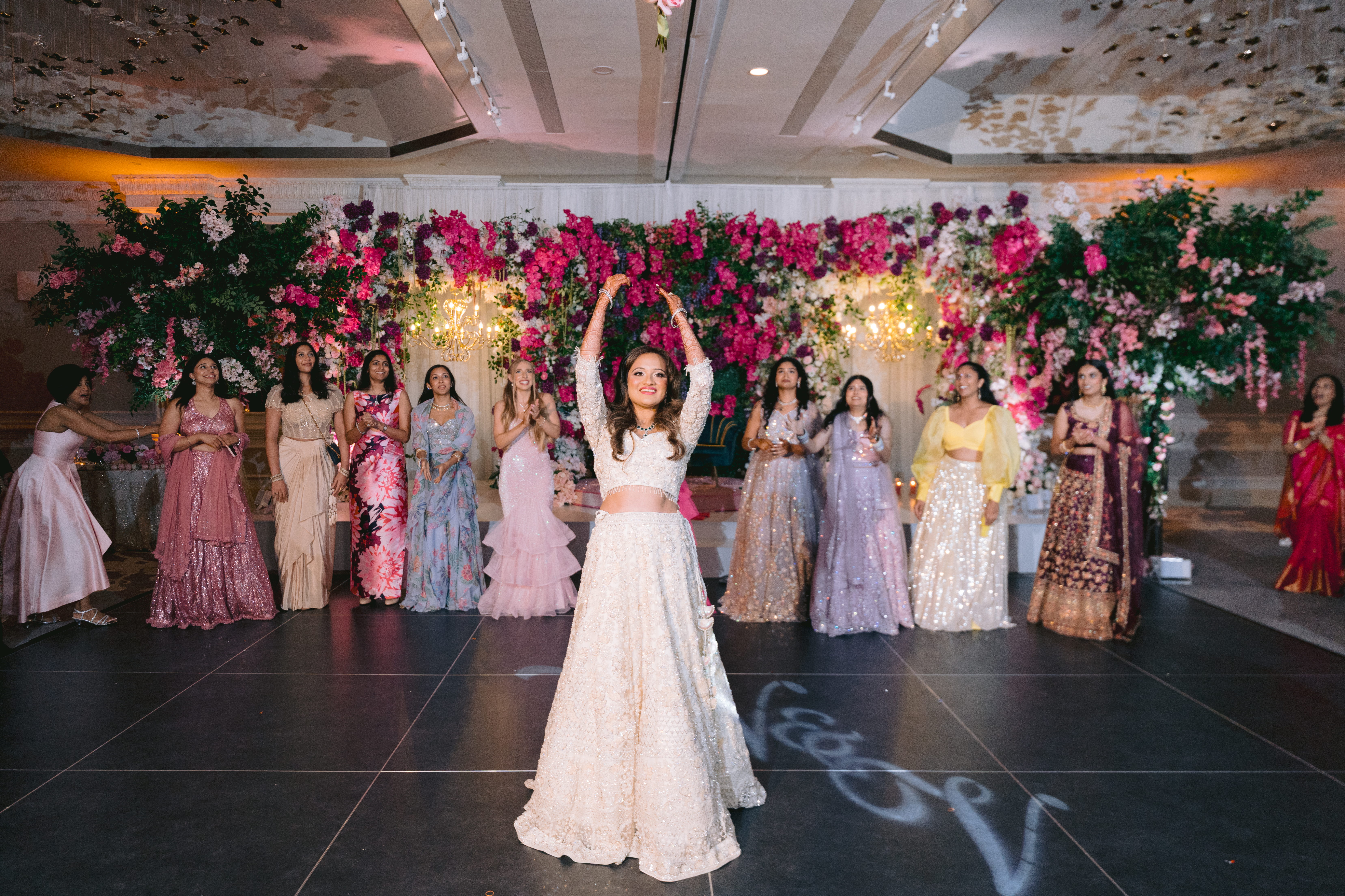 Bride throwing veil at Garden City Hotel wedding