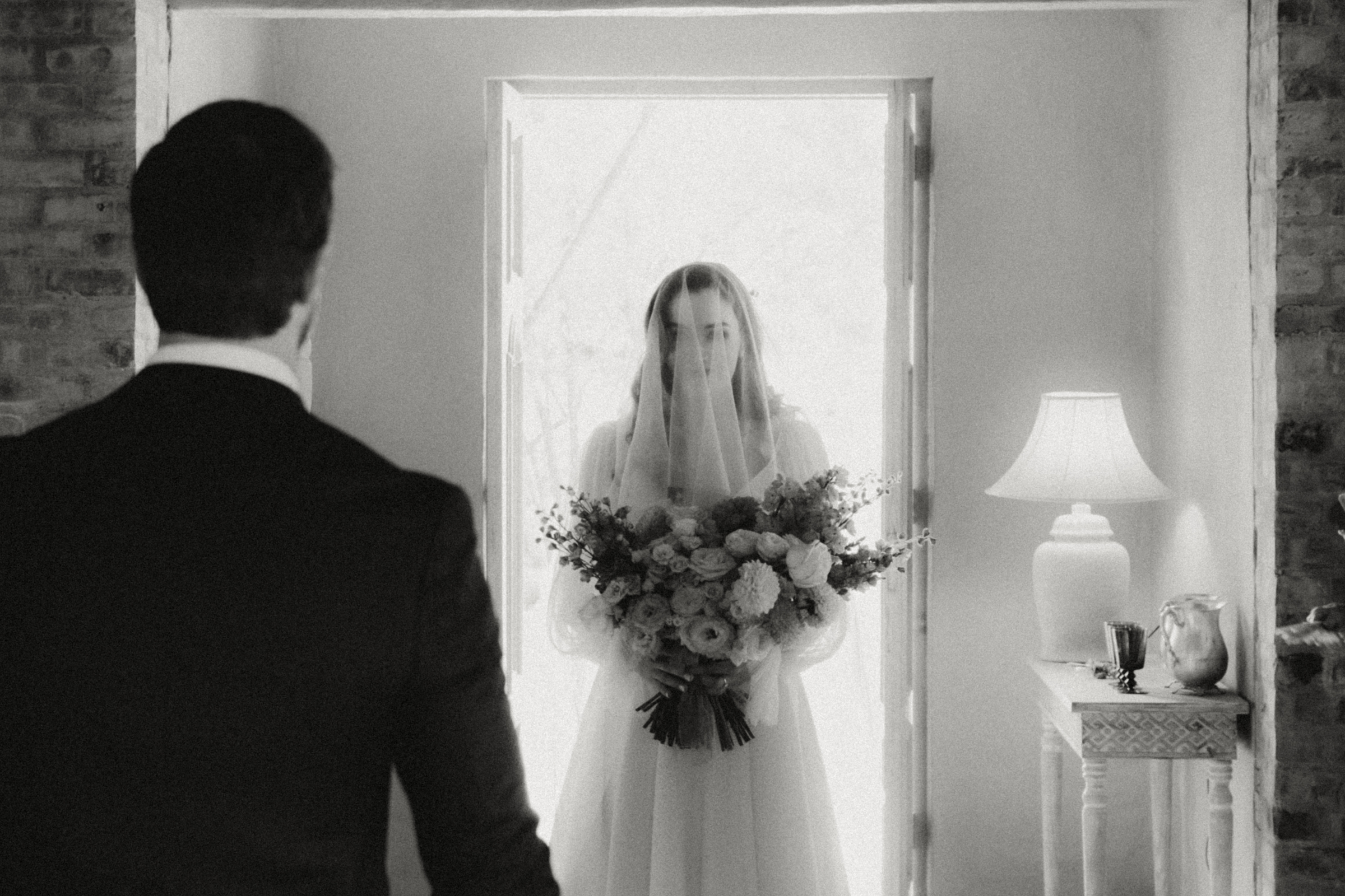 Bride in doorway to chapel at Champagne Living wedding in Pretoria