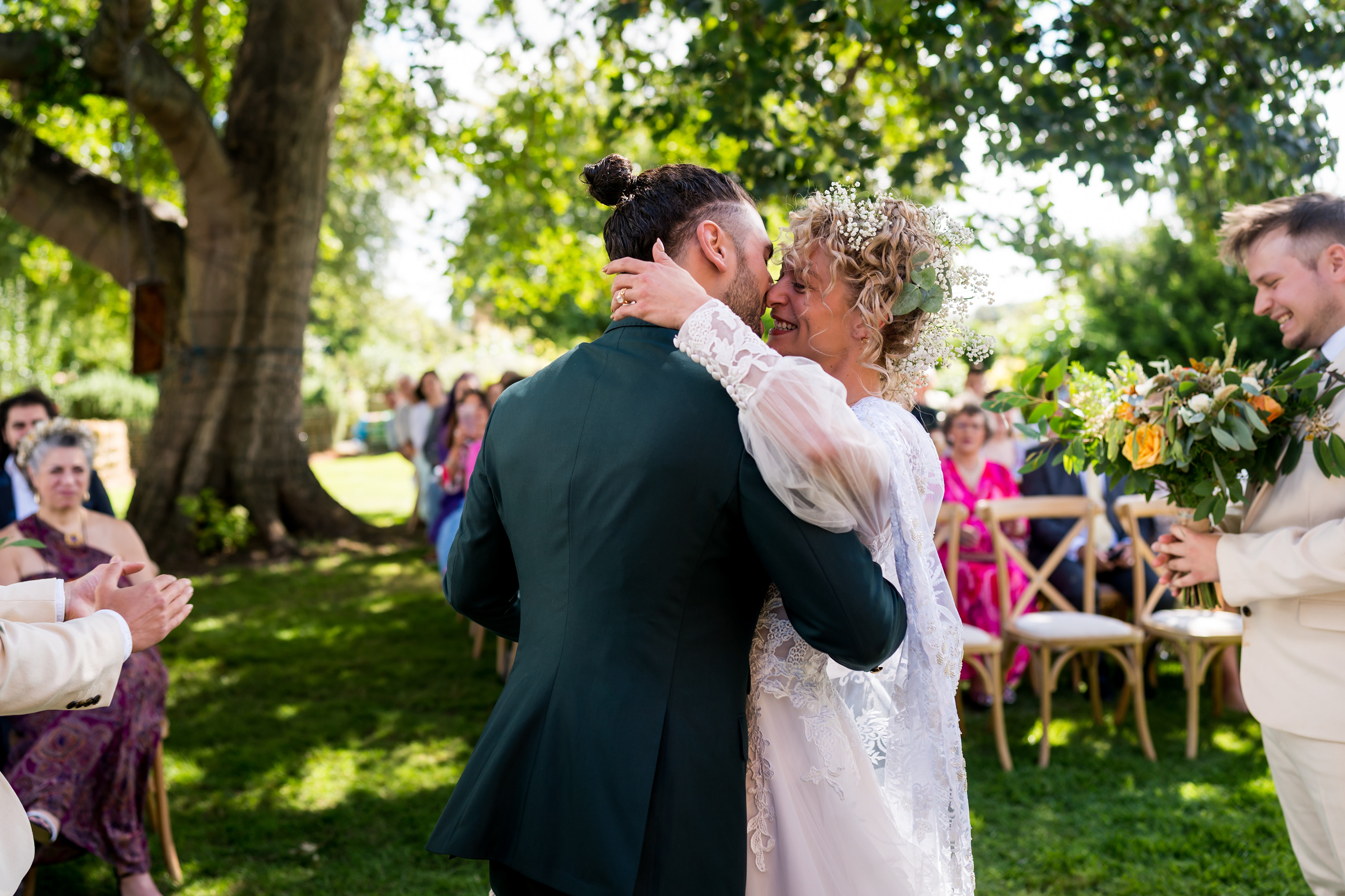 Bride and Groom's first kiss filled with happiness