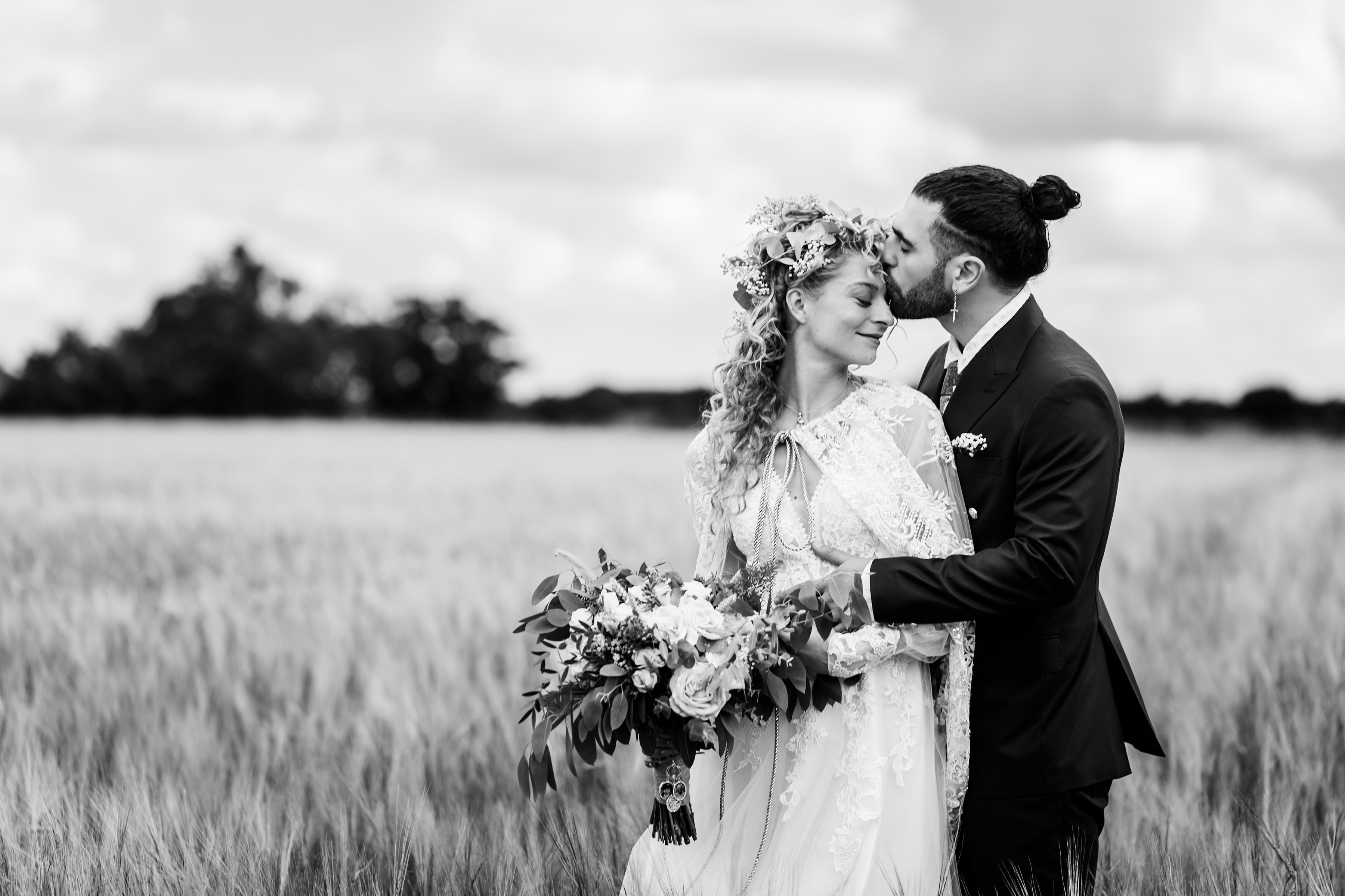 Couple portrait on countryside in a sweet moment