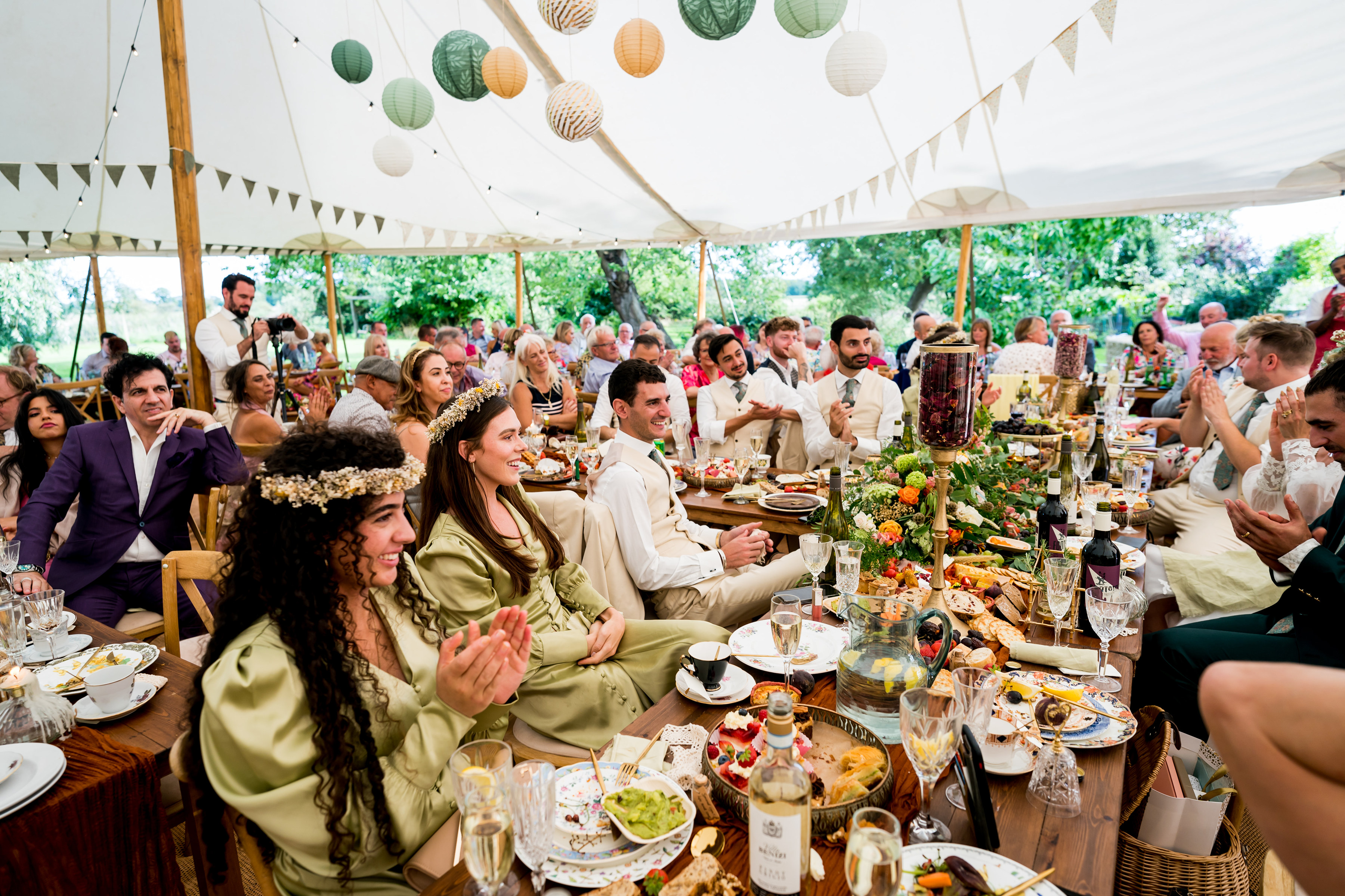 Guests enjoying being together laughing at reception