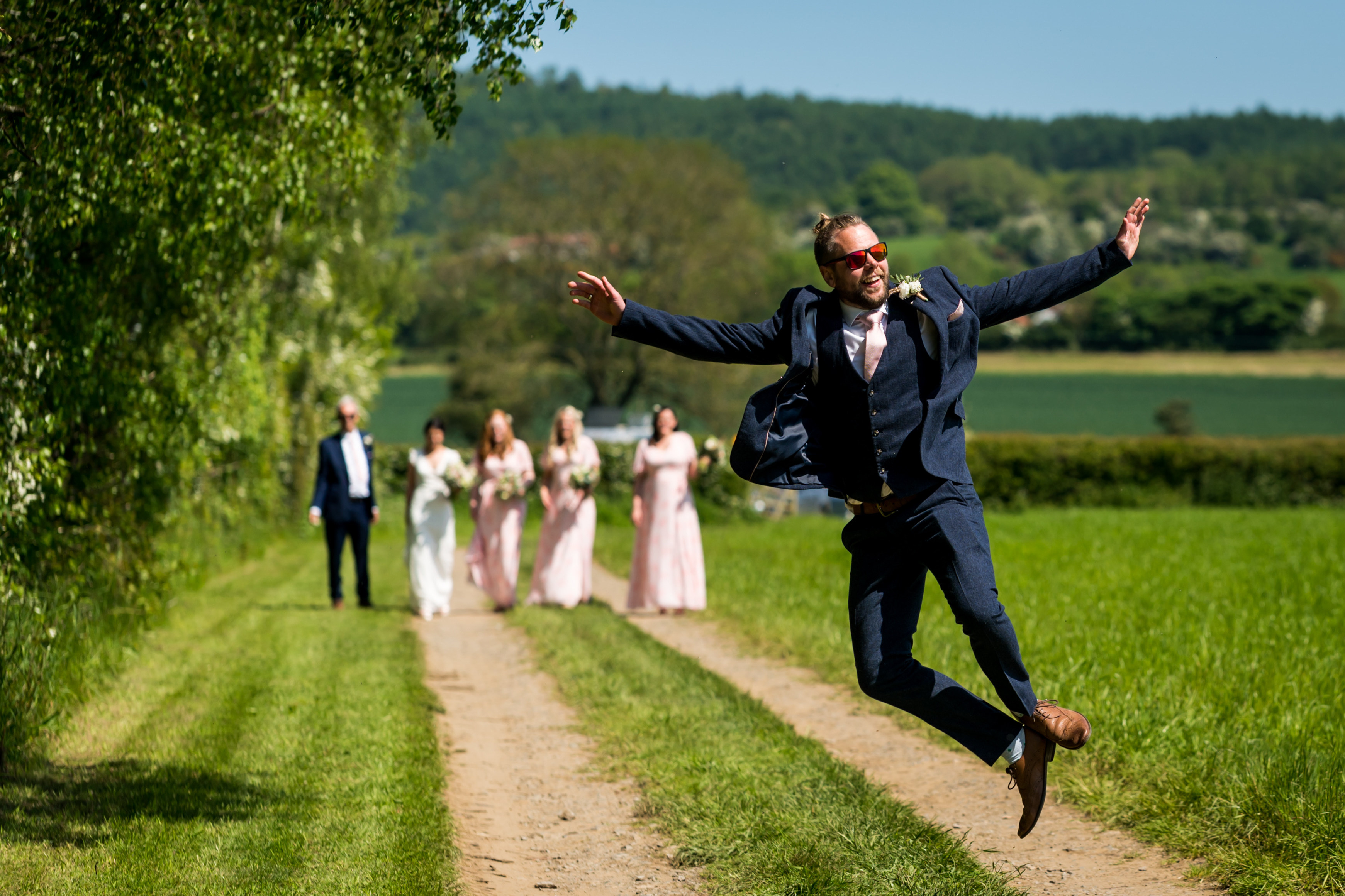 Groomsmen jumoing with excitement for the wedding day