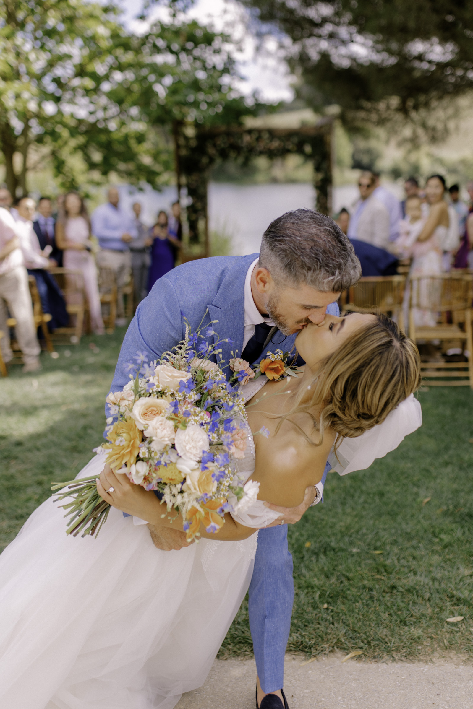 Kissing the bride after ceremony, Pedro Filipe Fotografia, Portugal wedding photographer