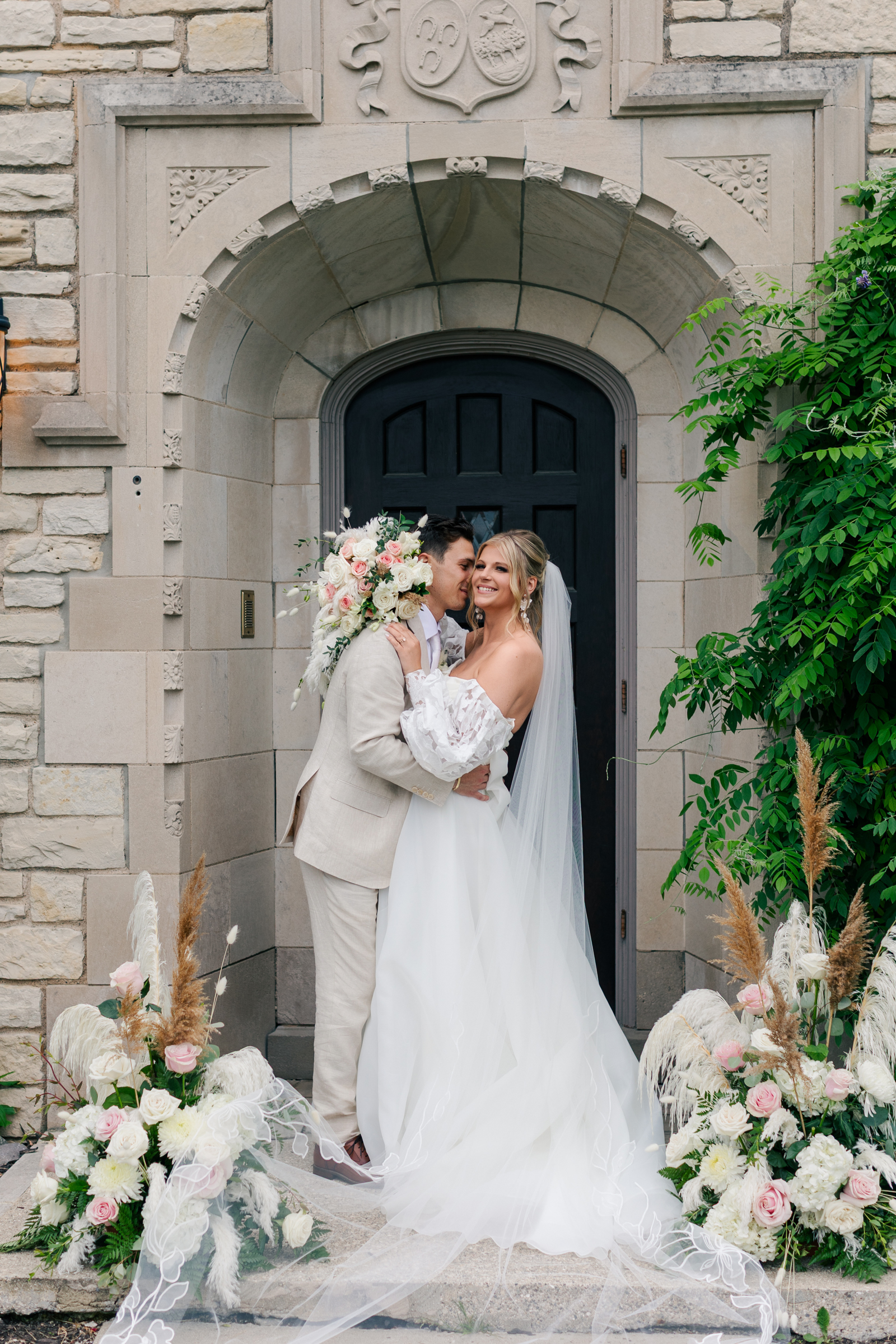 Venue3Two wedding entrance kiss by Chrystin Melanie Photography