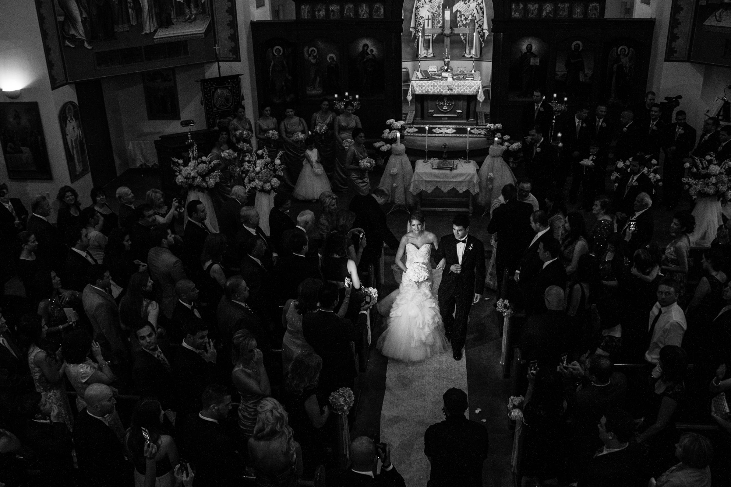 aerial-view-of-couple-recessional-in-church-md-photo-films