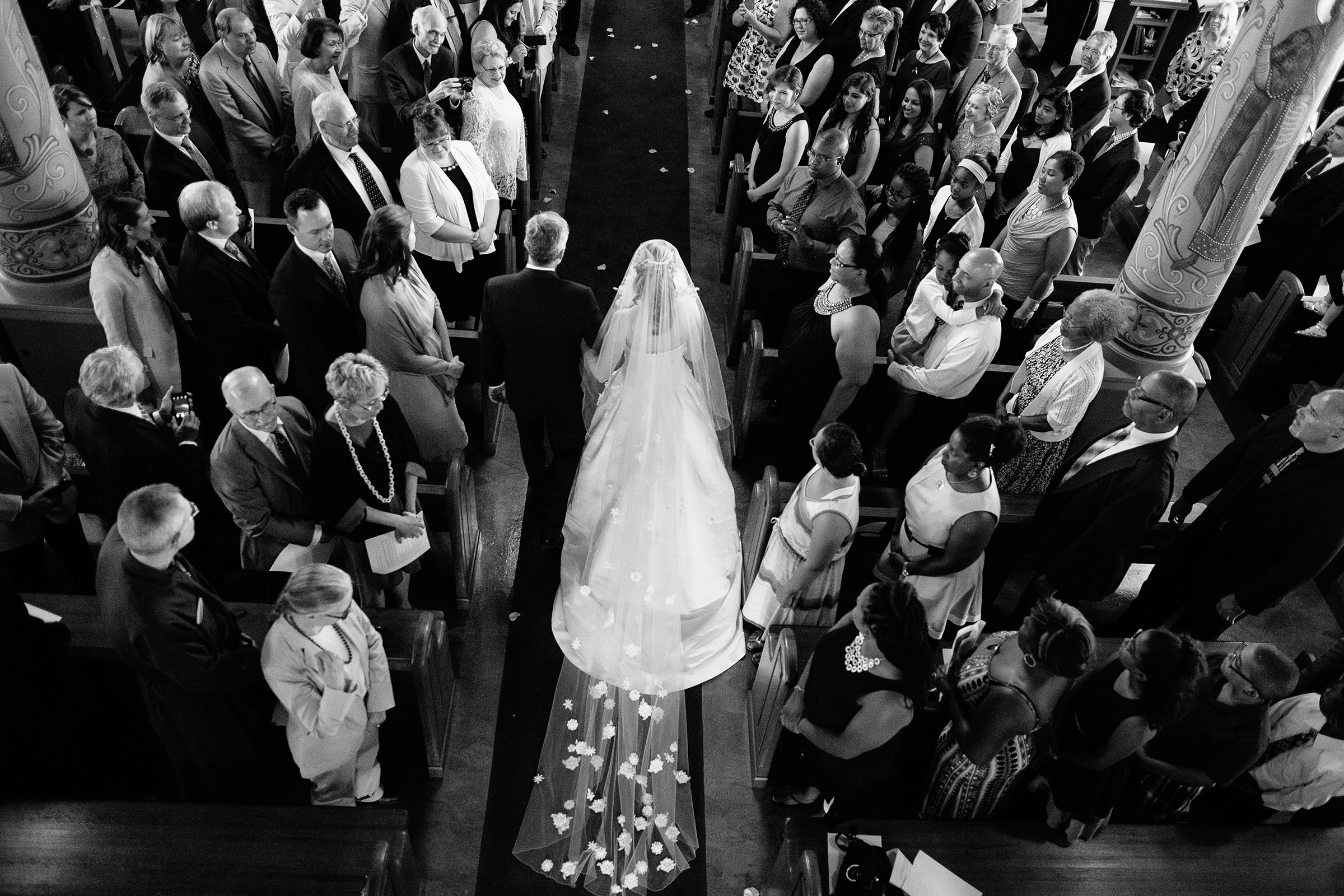 aerial-view-of-processional-in-crowded-church-photo-by-syphotography