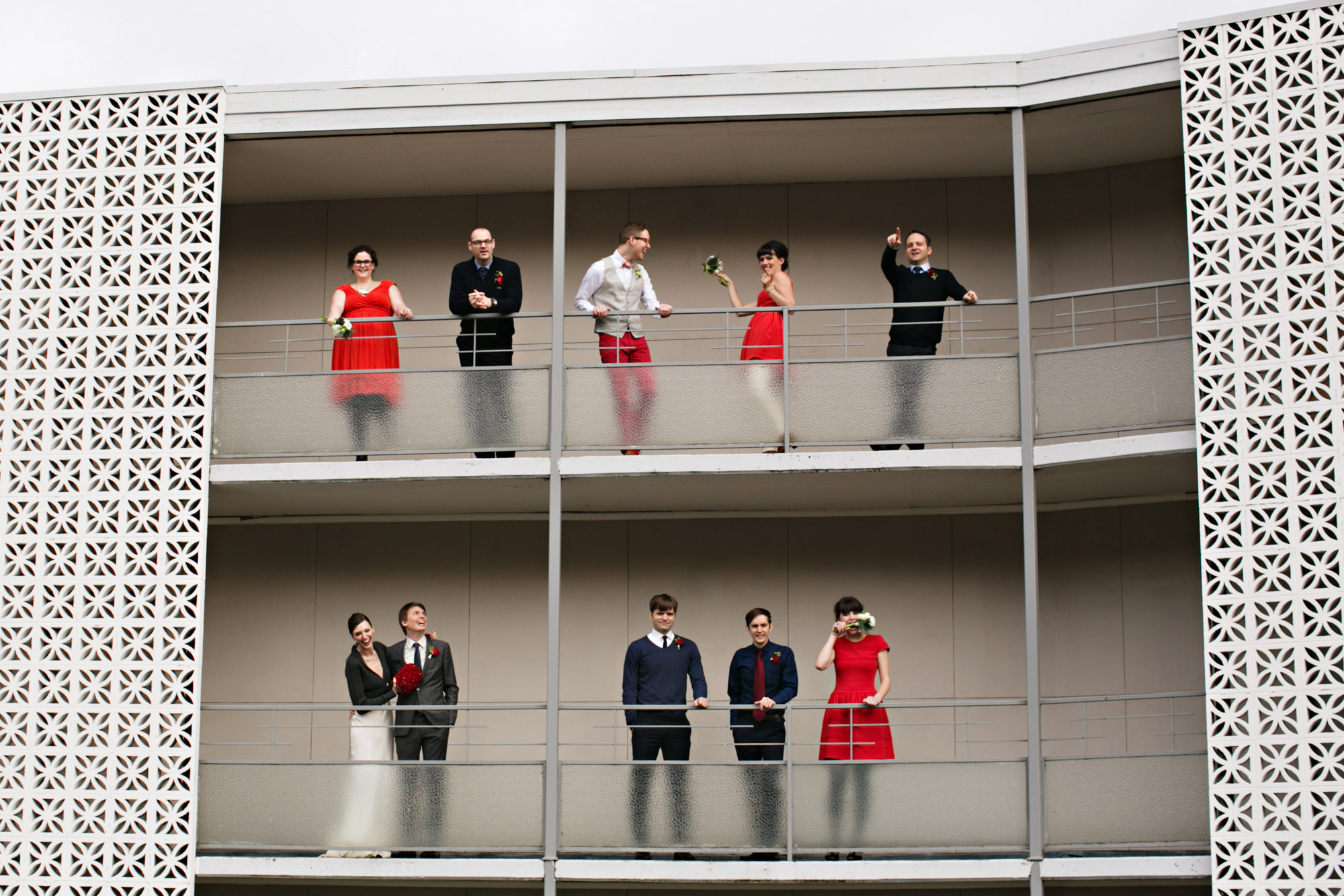 Bridesmaids wearing retro red dresses photographed by Jenny Jimenez - Seattle