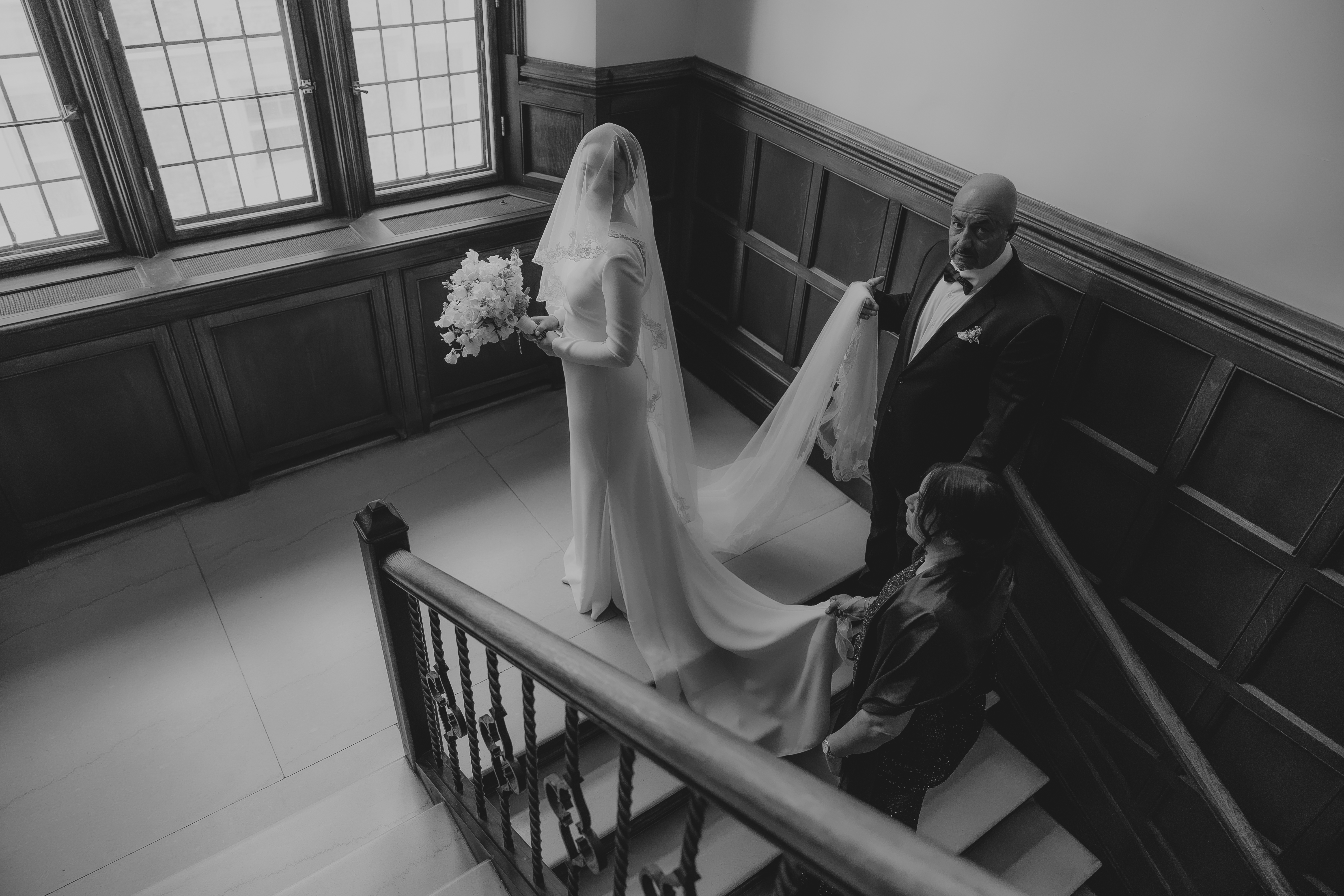 Bride walking up the stairs with Father-Carine Perras Photographe