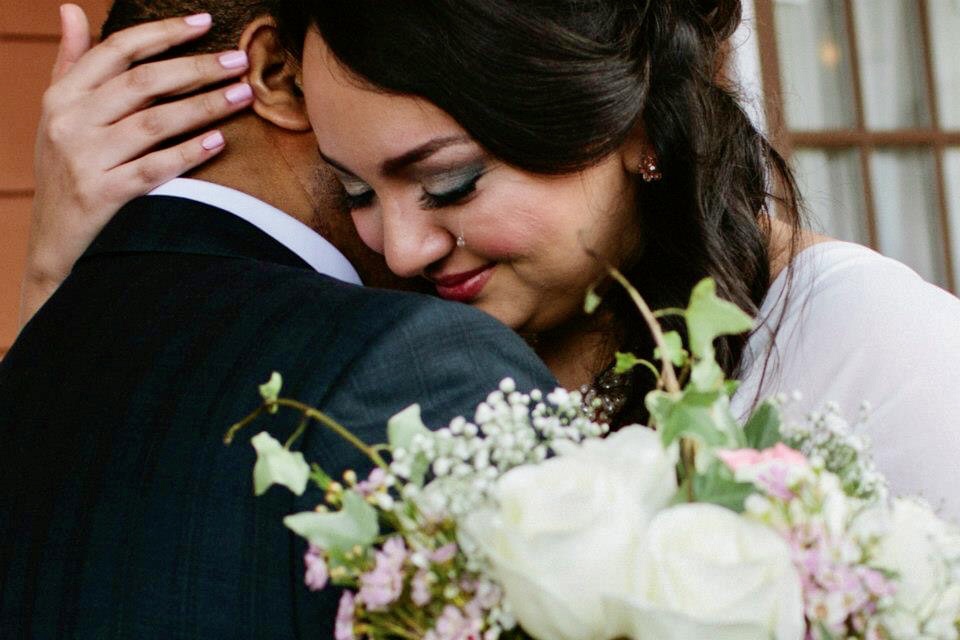 bride-embrace-with-groom-and-a-rolling-tear-md-photo-films