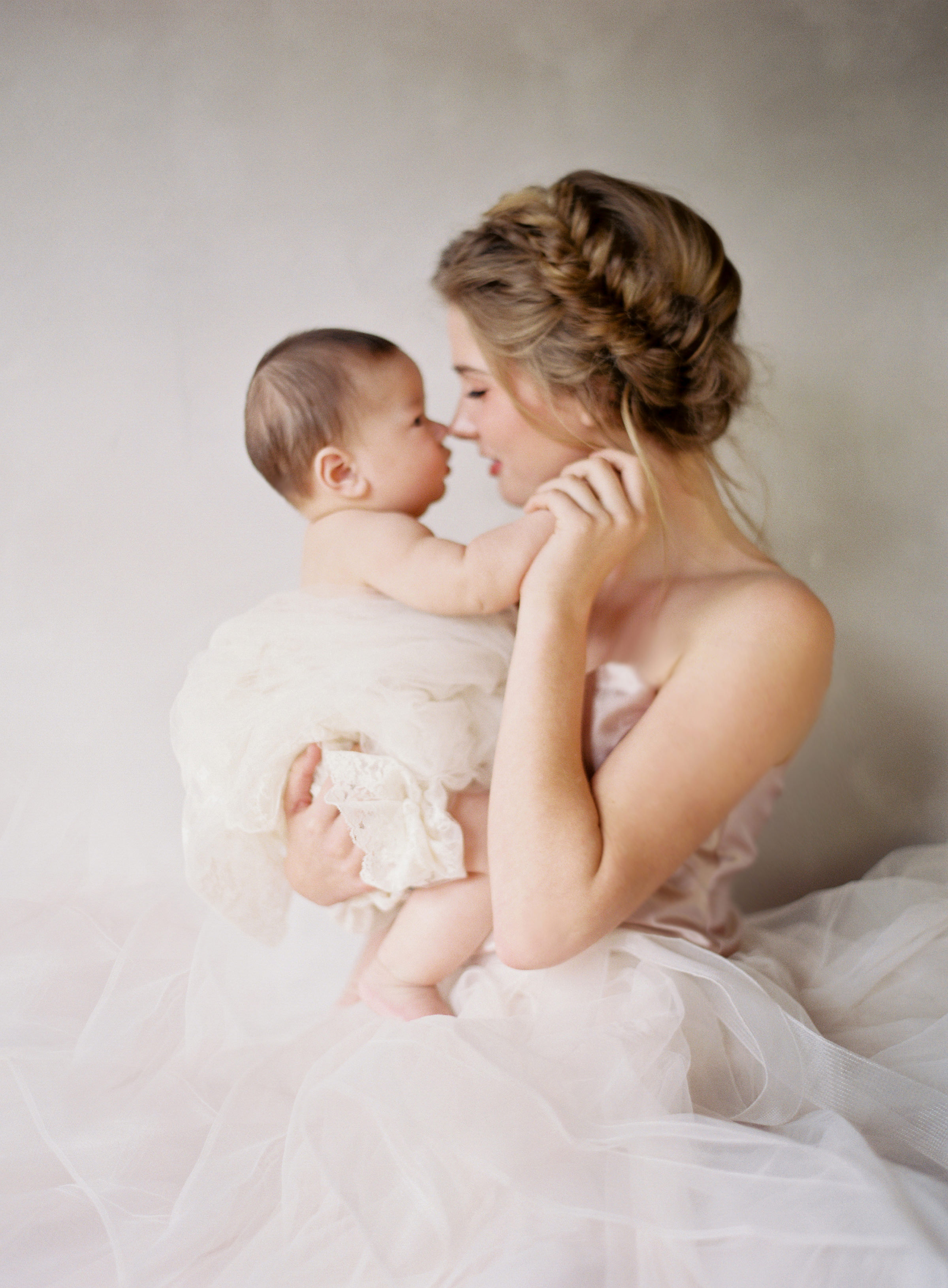 Bride with baby by Jen Huang Bogan of Santa Barbara