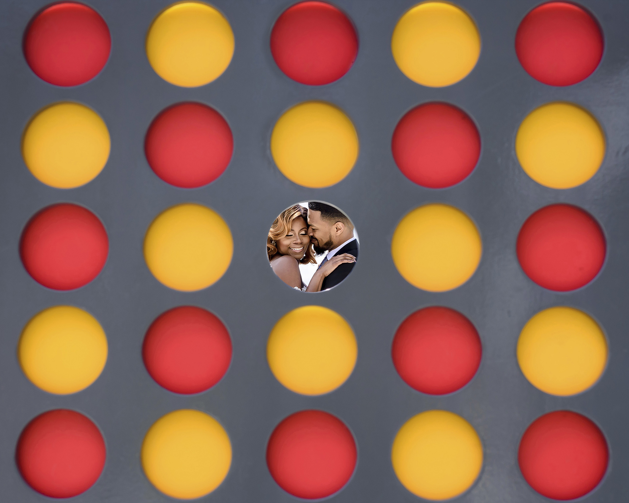 couple-seen-through-circle-sculpture-joshua-dwain-photography