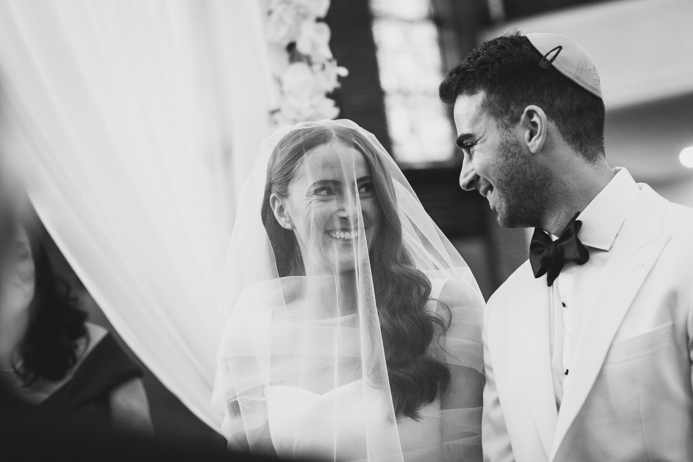 couple smiling during ceremony-Studio Baron Photo
