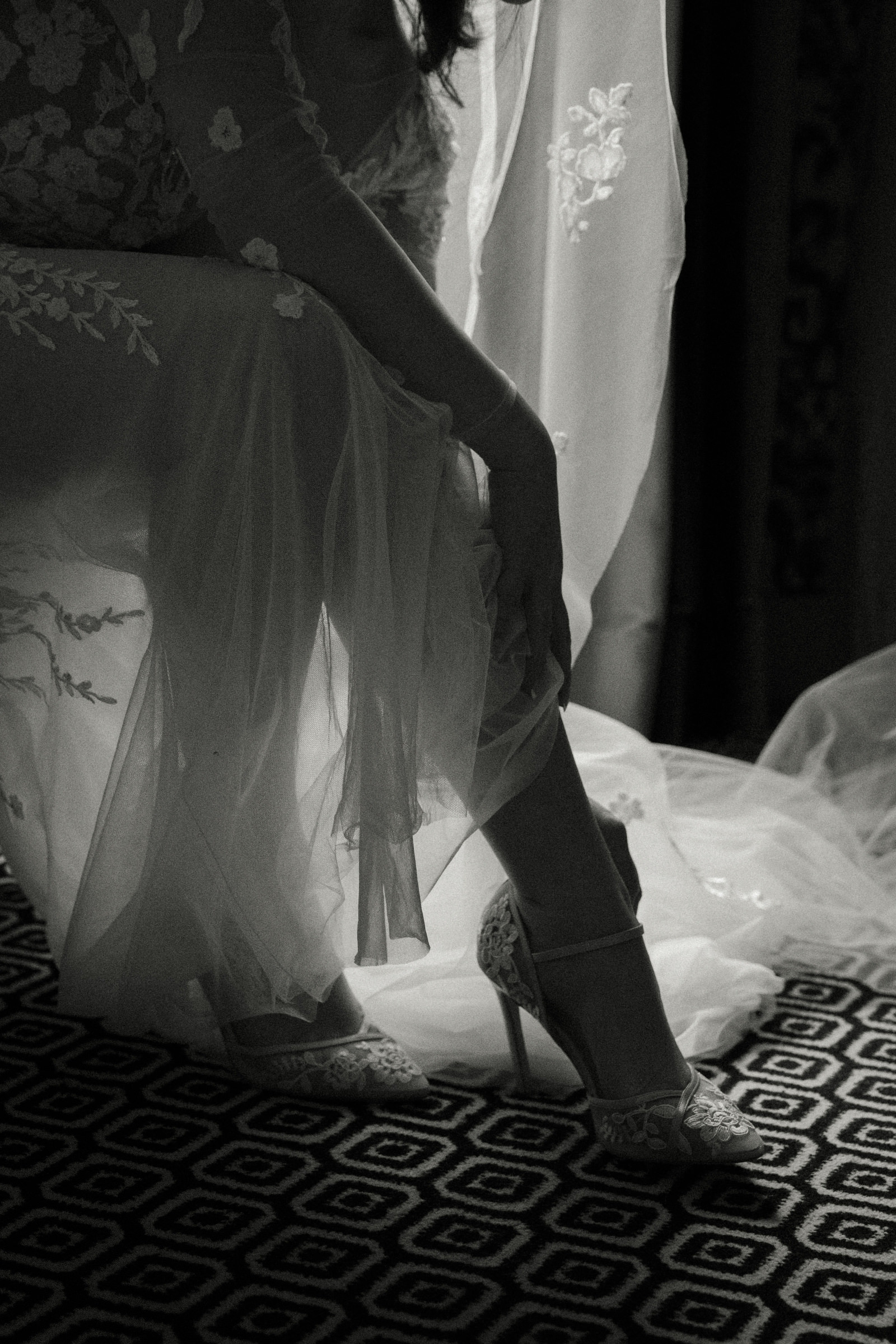 bride putting on shoe-Myriam Menard Photographe