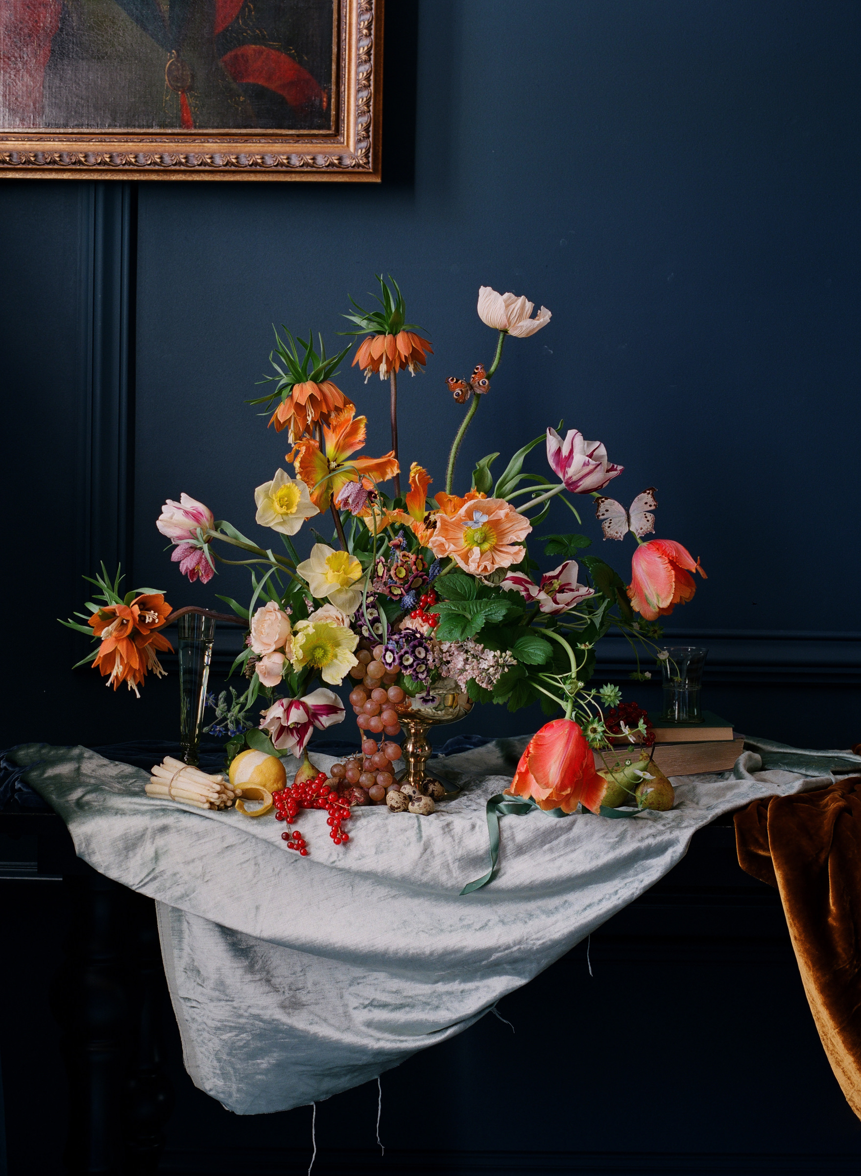 Floral centerpieces with tulips, poppies, and fritallari photographed by Corbin Gurkin - South Carolina