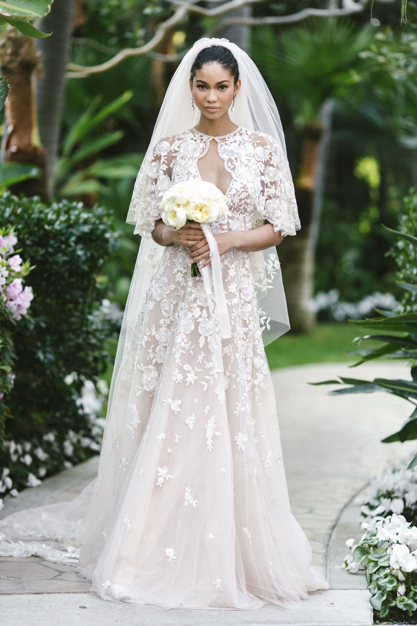 Elegant black bride in lace gown and veil by Amy and Stuart of Los Angeles