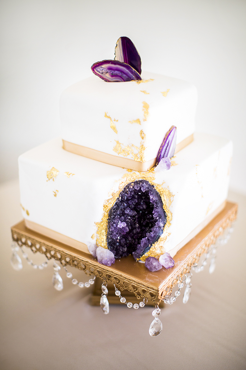 Wedding cake with purple amethyst geode inside photographed by Anna Schmidt