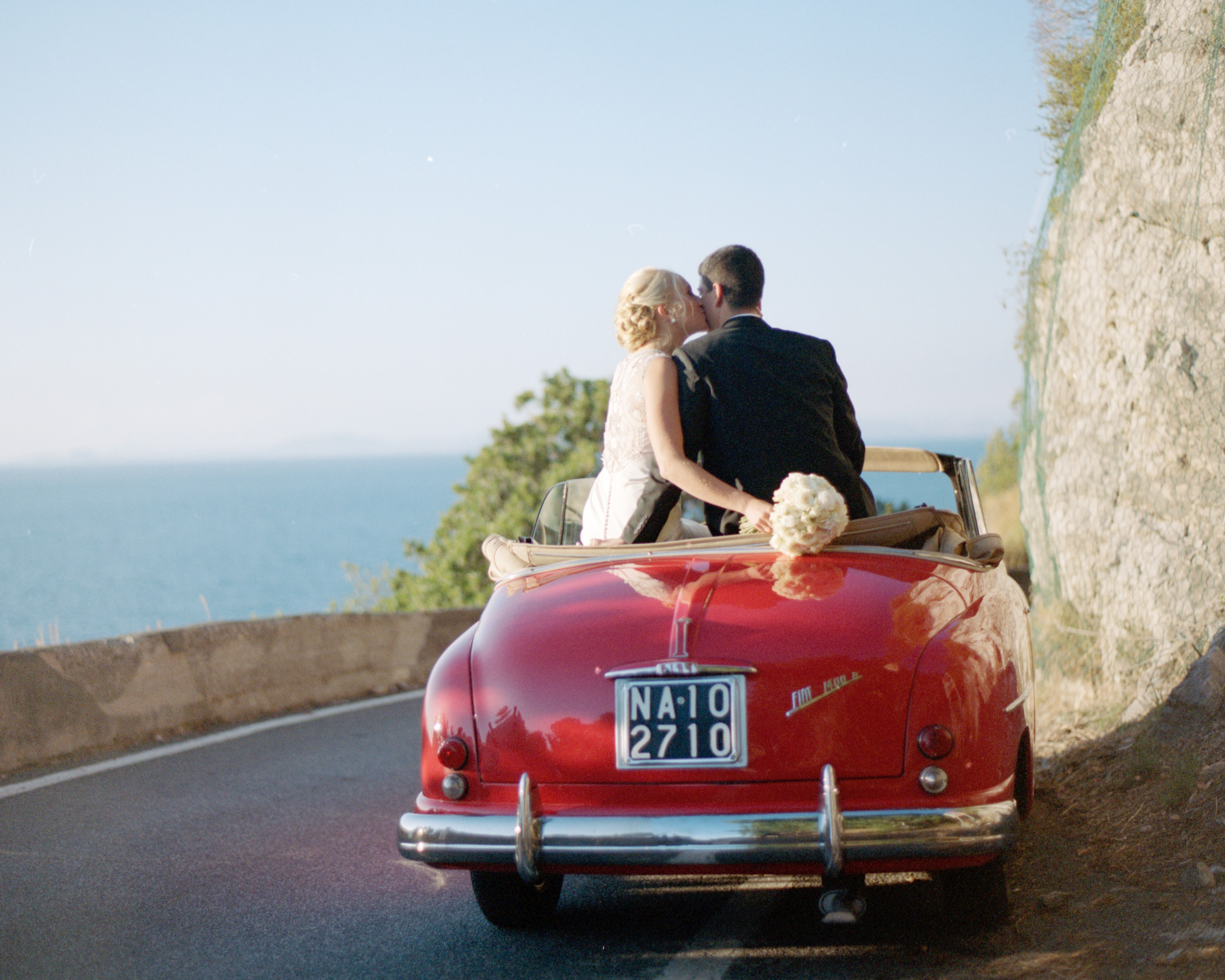 Best wedding photographers in Texas, Kelly Durham car getaway