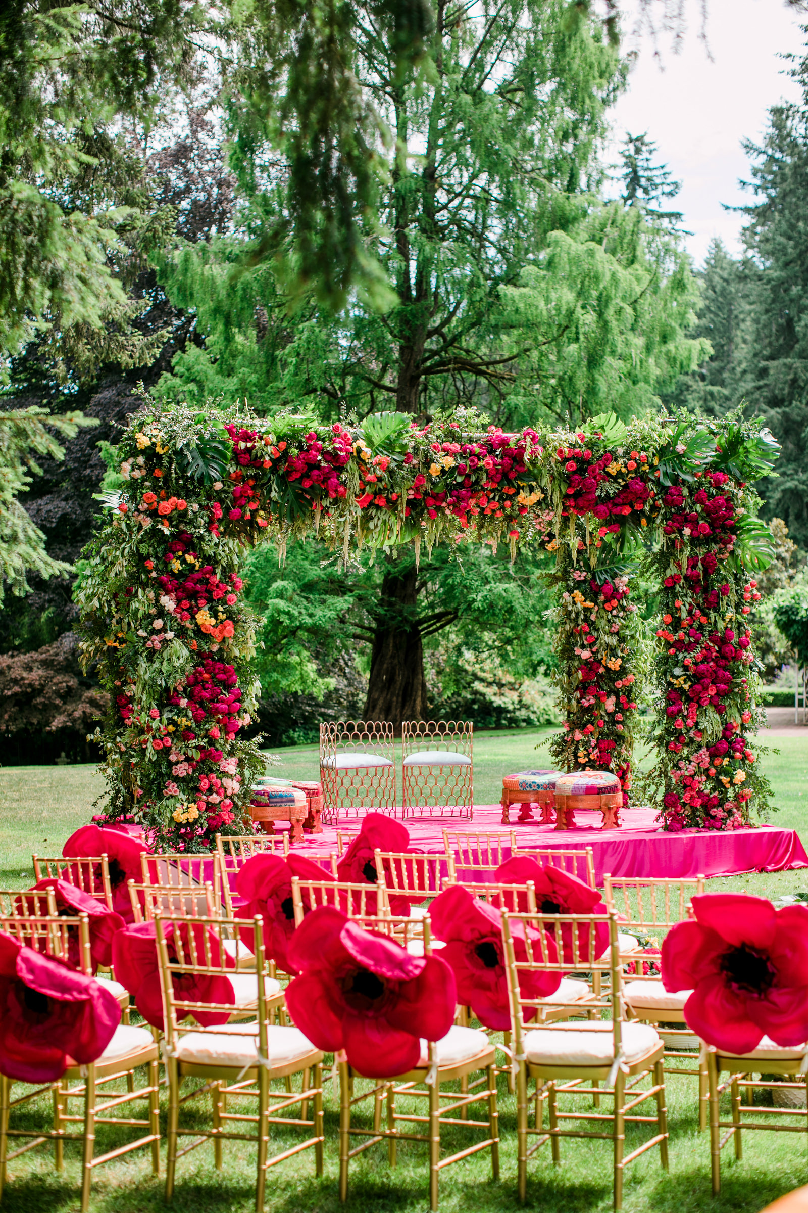 Paper poppies on chair backs for outdoor ceremony photographed by Into Dust Photography - Seattle