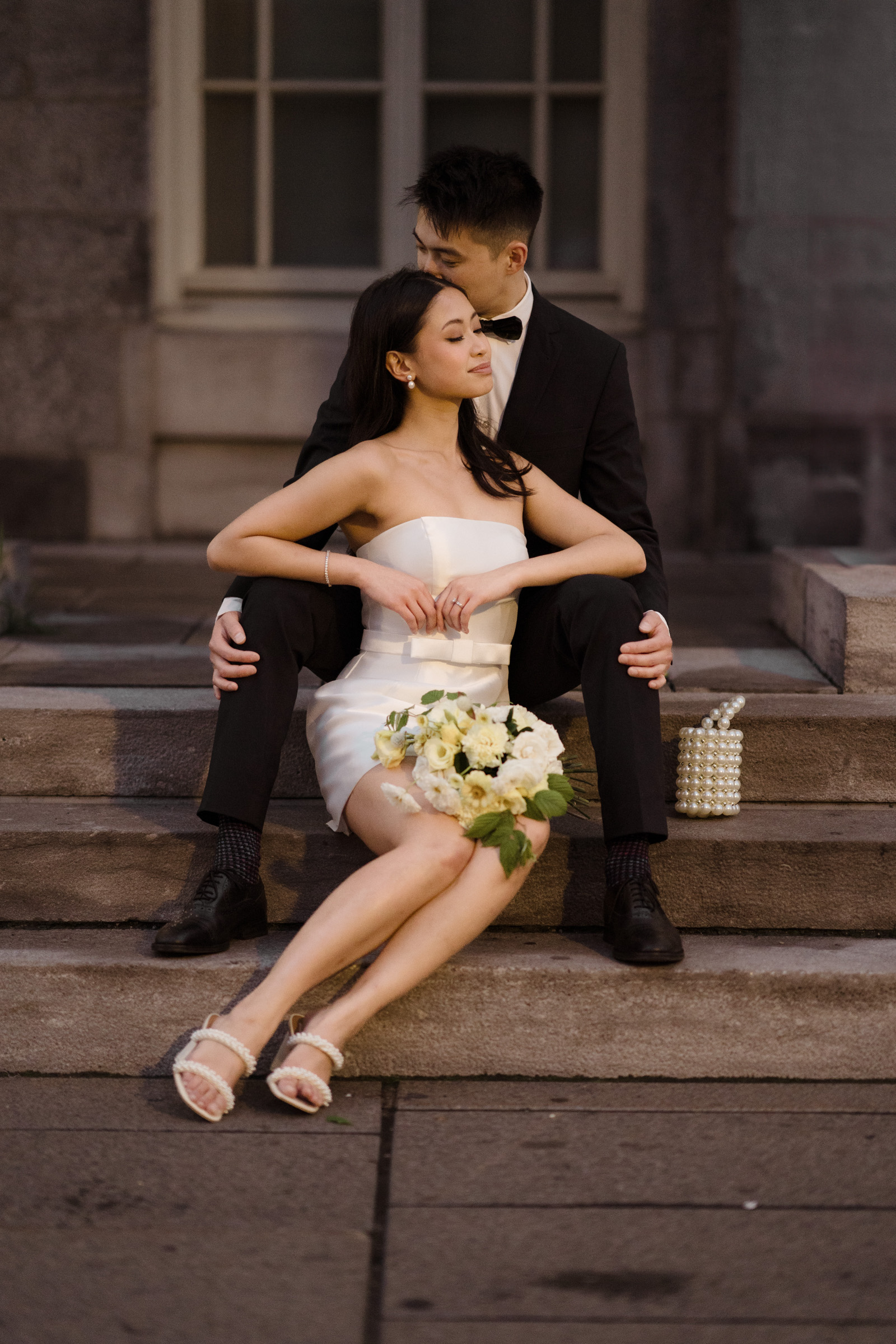 chic, short strapless wedding dress, photographed by Kara Films, Montreal wedding photographers