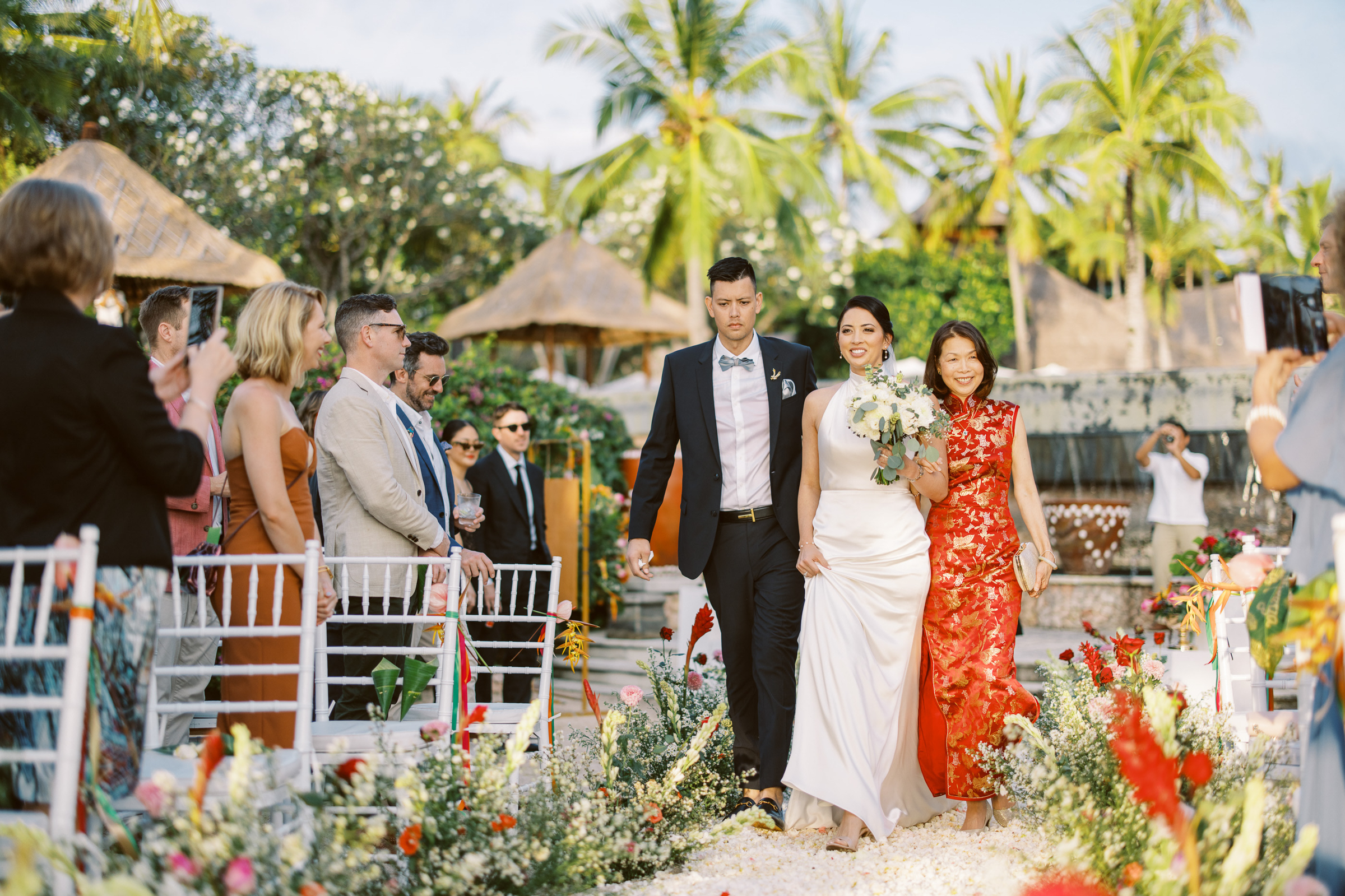 Bride coming down the aisle at the Oberoi Resort Lombok, Sylvain Bouzat Photography
