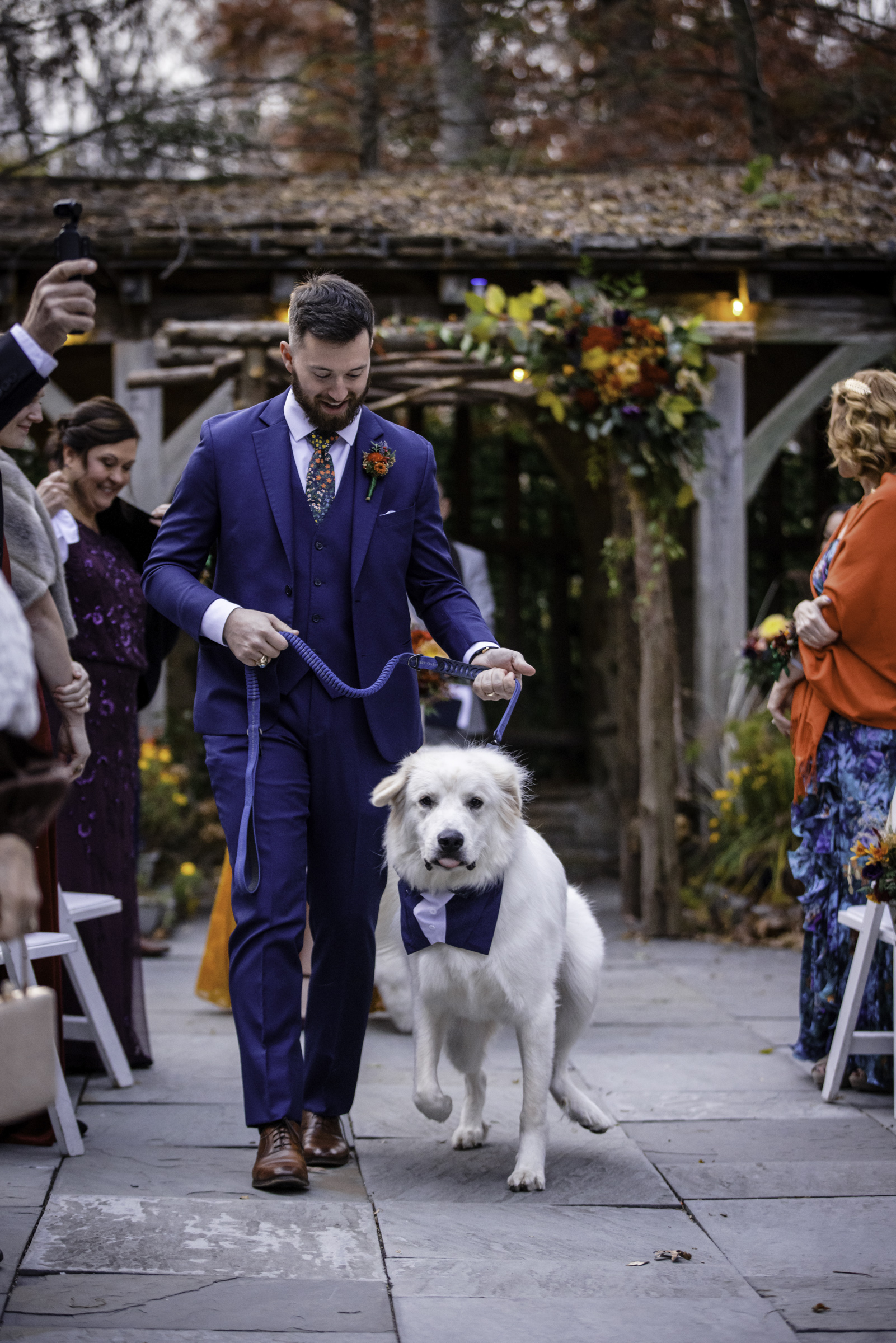 Dog coming down the aisle, wedding ceremony at Cloister Castle photography by Bee Two Sweet