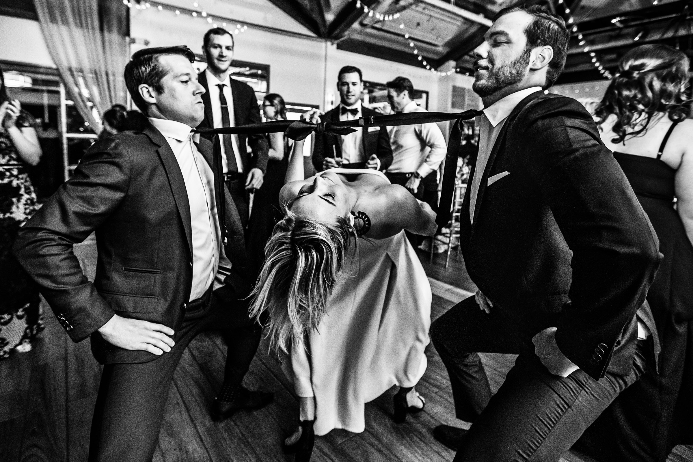 Award winning wedding reception limbo fun- photo by Michelle Arlotta Photography