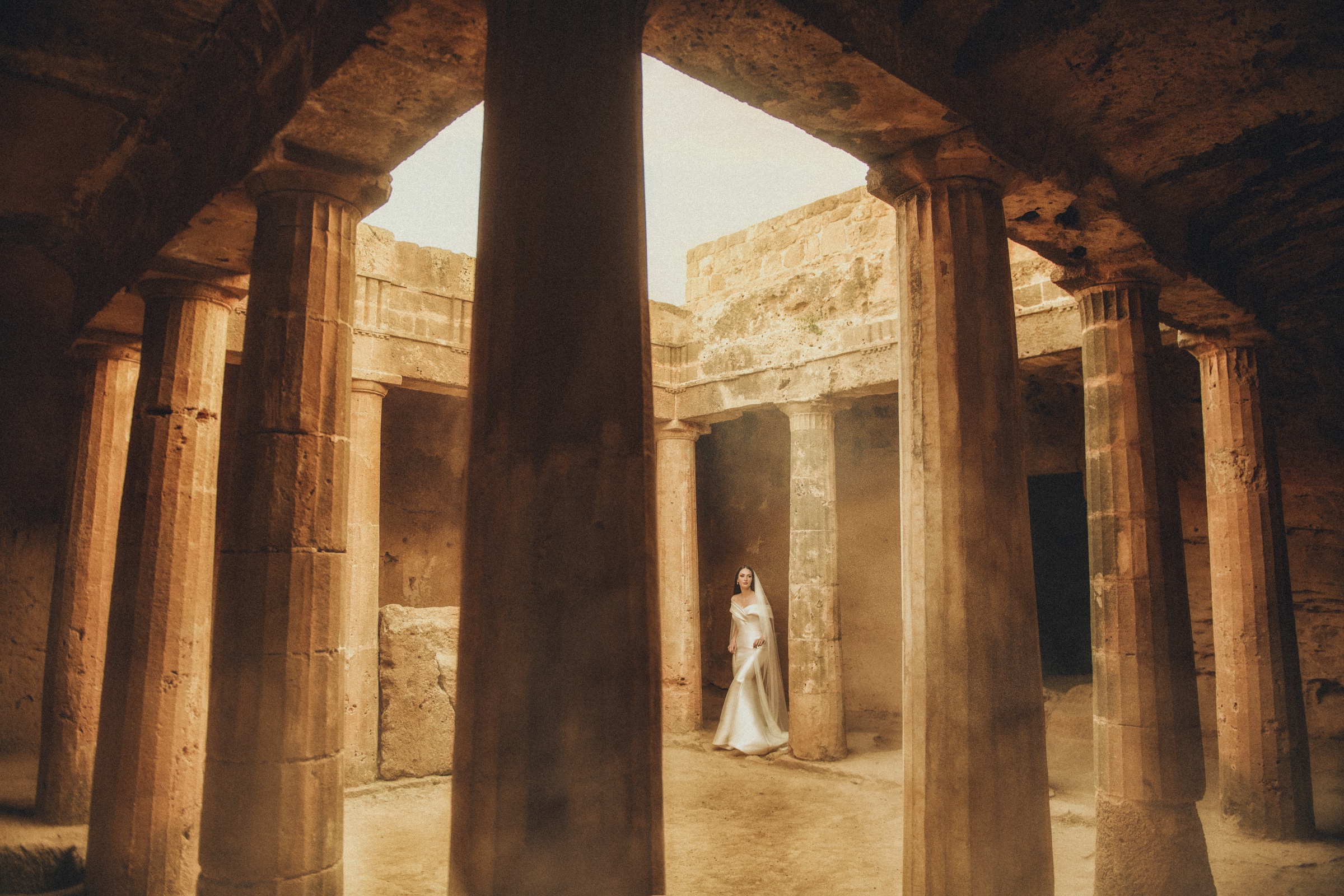 Bride walking through ancient Roman ruins - photo by John Makris Photography-Greece wedding photographer Bride walking through ancient Roman ruins - photo by John Makris Photography-Greece wedding photographer