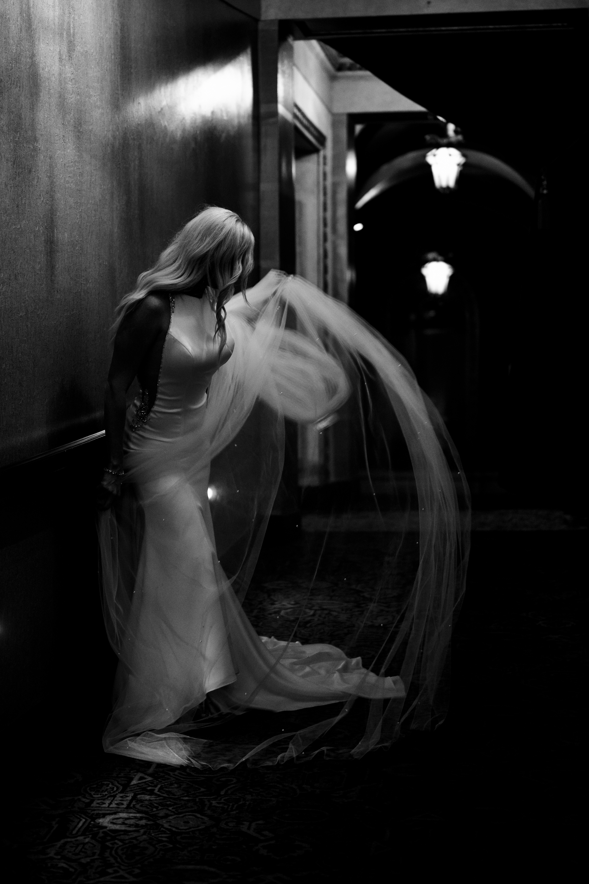 Black and white portrait of a bride in motion - photo by New Orleans wedding photographer Andrew Alwert Studios Black and white portrait of a bride in motion - photo by New Orleans wedding photographer Andrew Alwert Studios