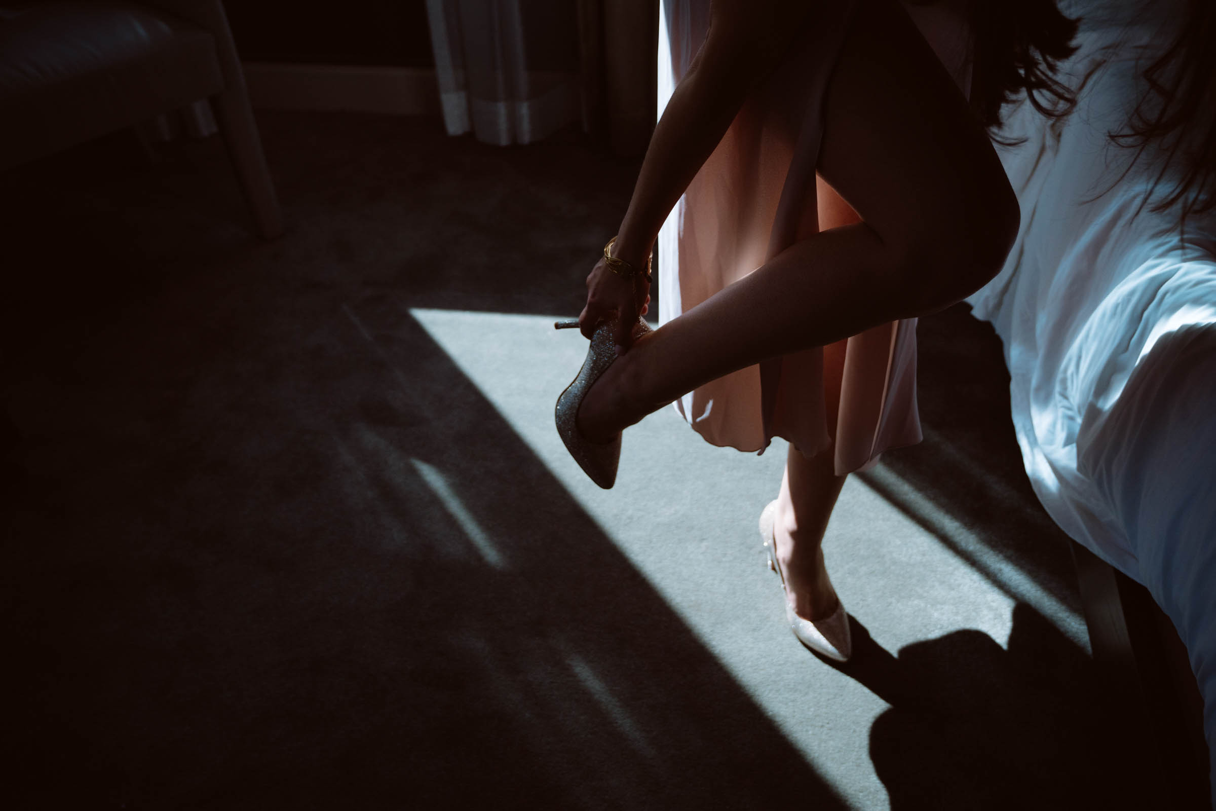 Bride puts shoe on in door light - photo by Jessica Hill Photography-Portland Oregon wedding photographer Bride puts shoe on in door light - photo by Jessica Hill Photography-Portland Oregon wedding photographer