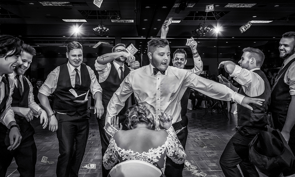 Award winning money dance with bride and groom - photo by Amber Henry Photography