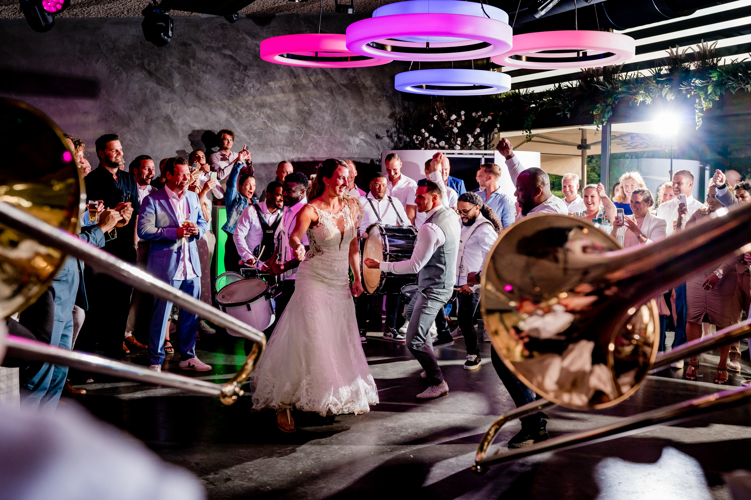Award winner, bride and groom dancing to brass band - photo by Kristof Claeys Photography, Belgium