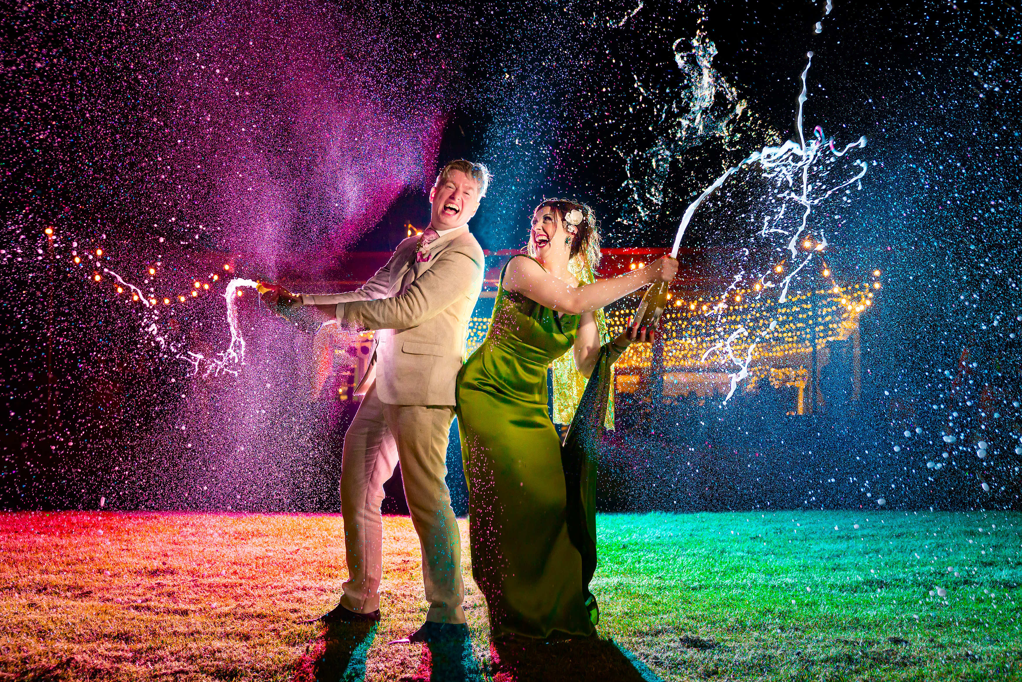 Award winner-bride and groom spraying champagne Ben Connolly Creative, Australia