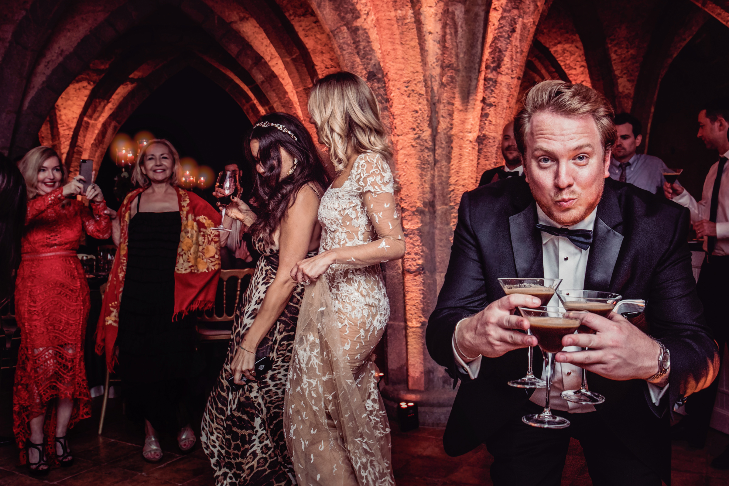 Award winner, guest holding three glasses, JoAnne Dunn Photographers,Ravello, Italy