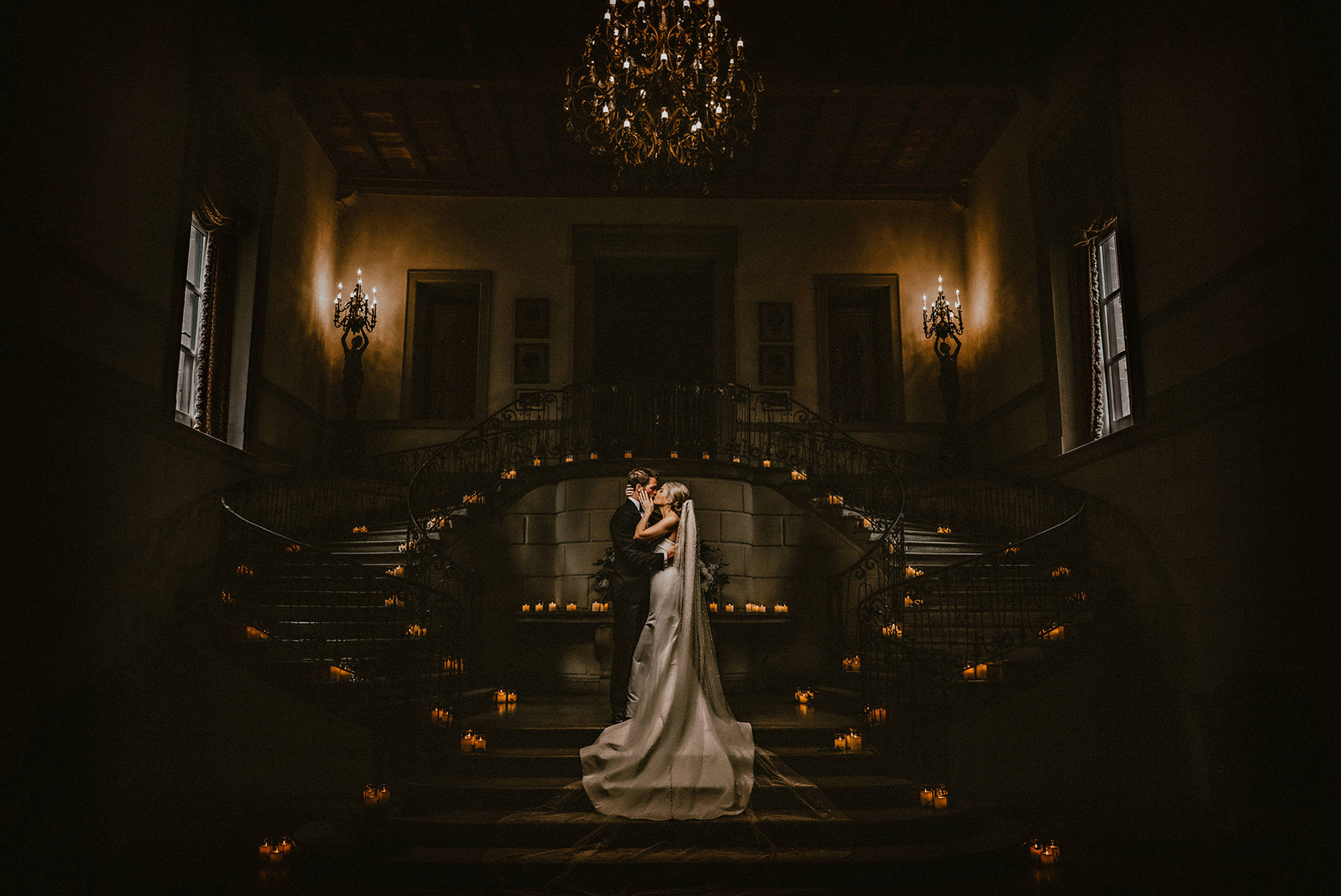 Picture Perfect Portrait winner of a dark and moody photo of bride and groom on stairs - photo by Jeff Tisman Photography-NY