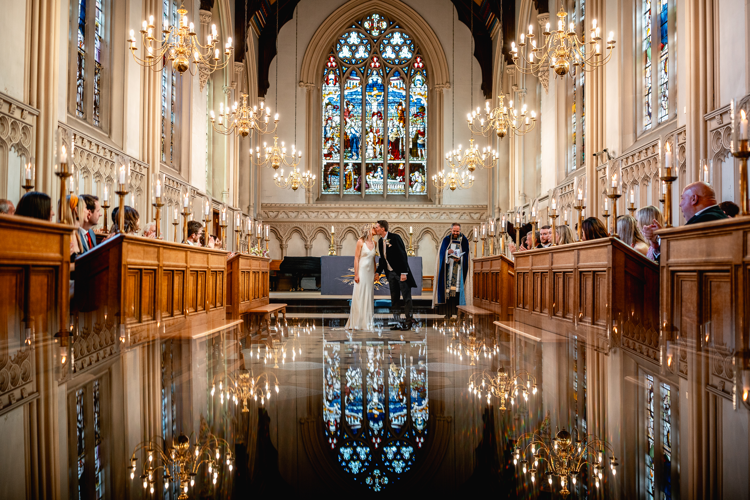 Picture Perfect Portrait winner of couple kissing in church with reflection - photo by Ben Minnaar Photography, UK