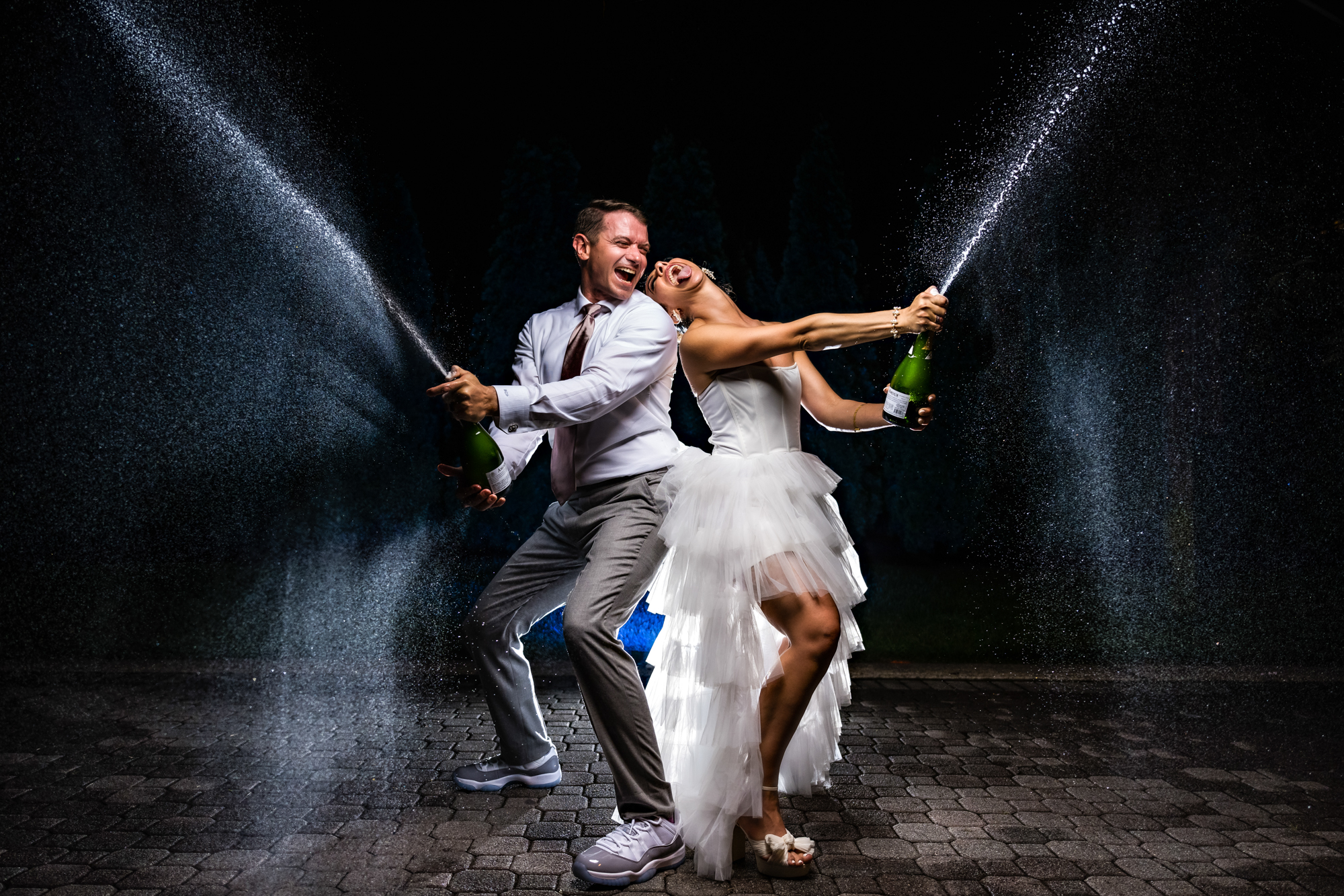 Picture Perfect Portrait winner of Couple spraying champagne - photo by Jeff Tisman Photography-New York wedding photographer