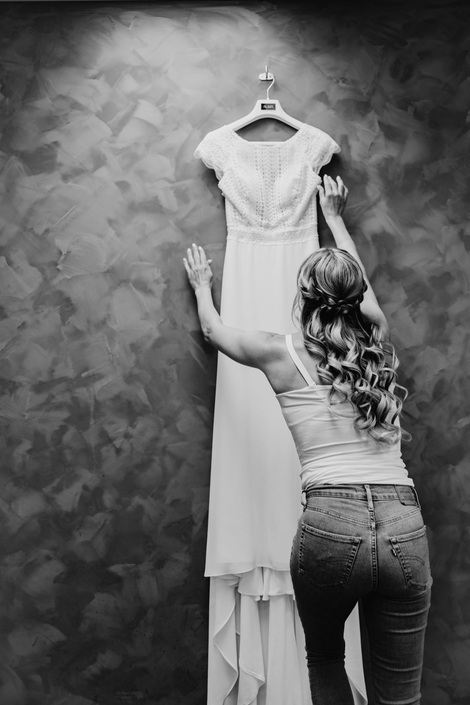 Bride getting gown - photo by Karmøy Foto