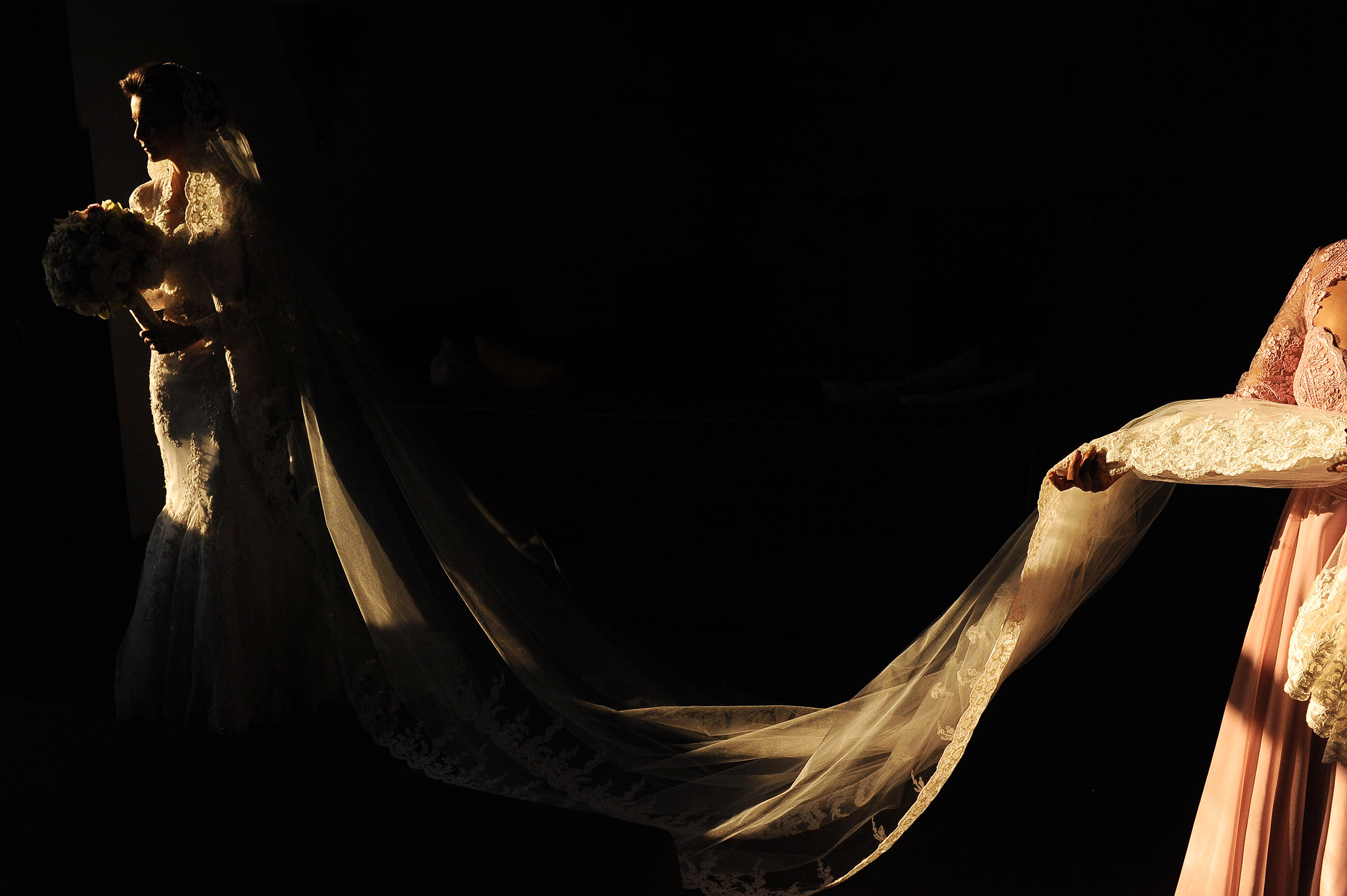 Bride in dramatic window light - photo by Citlalli Rico Photography